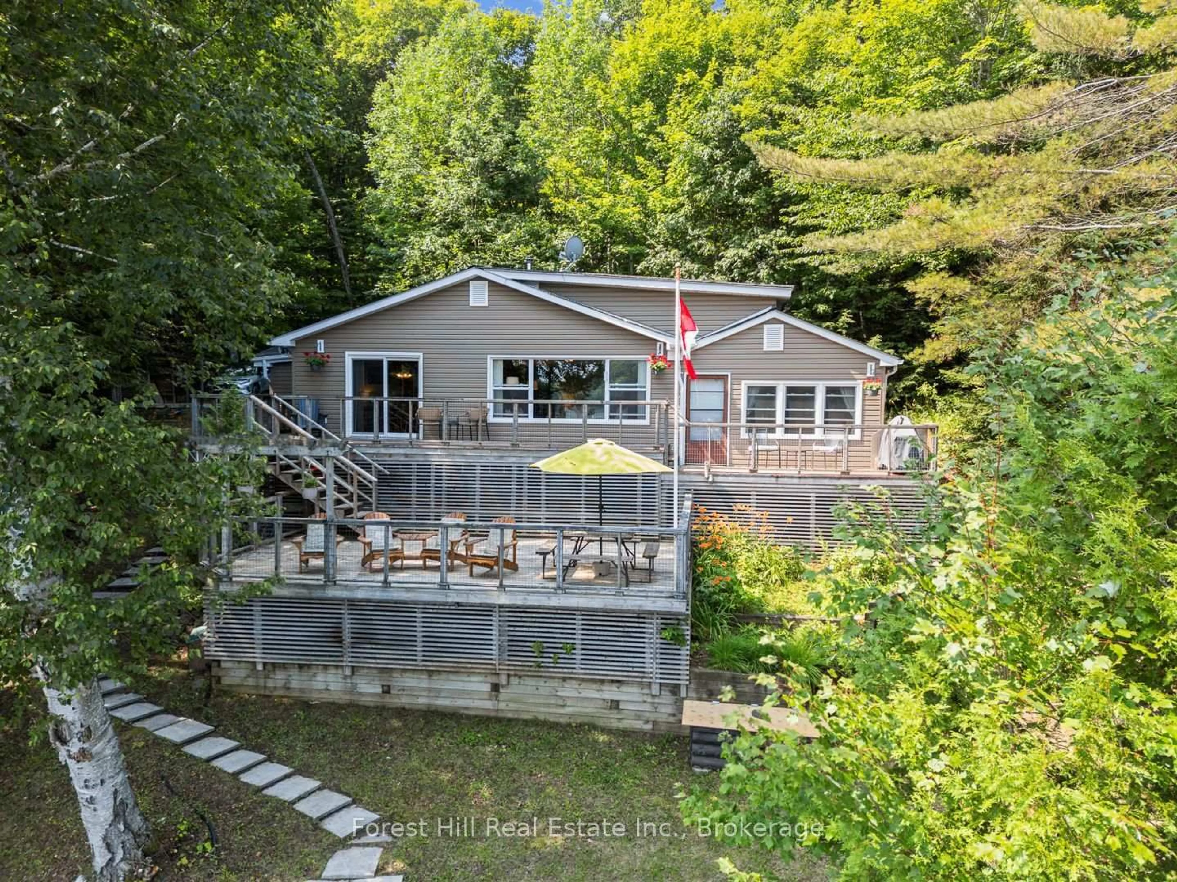 A pic from outside/outdoor area/front of a property/back of a property/a pic from drone, water/lake/river/ocean view for 3477 Livingstone Lake Rd, Algonquin Highlands Ontario P0A 1E0