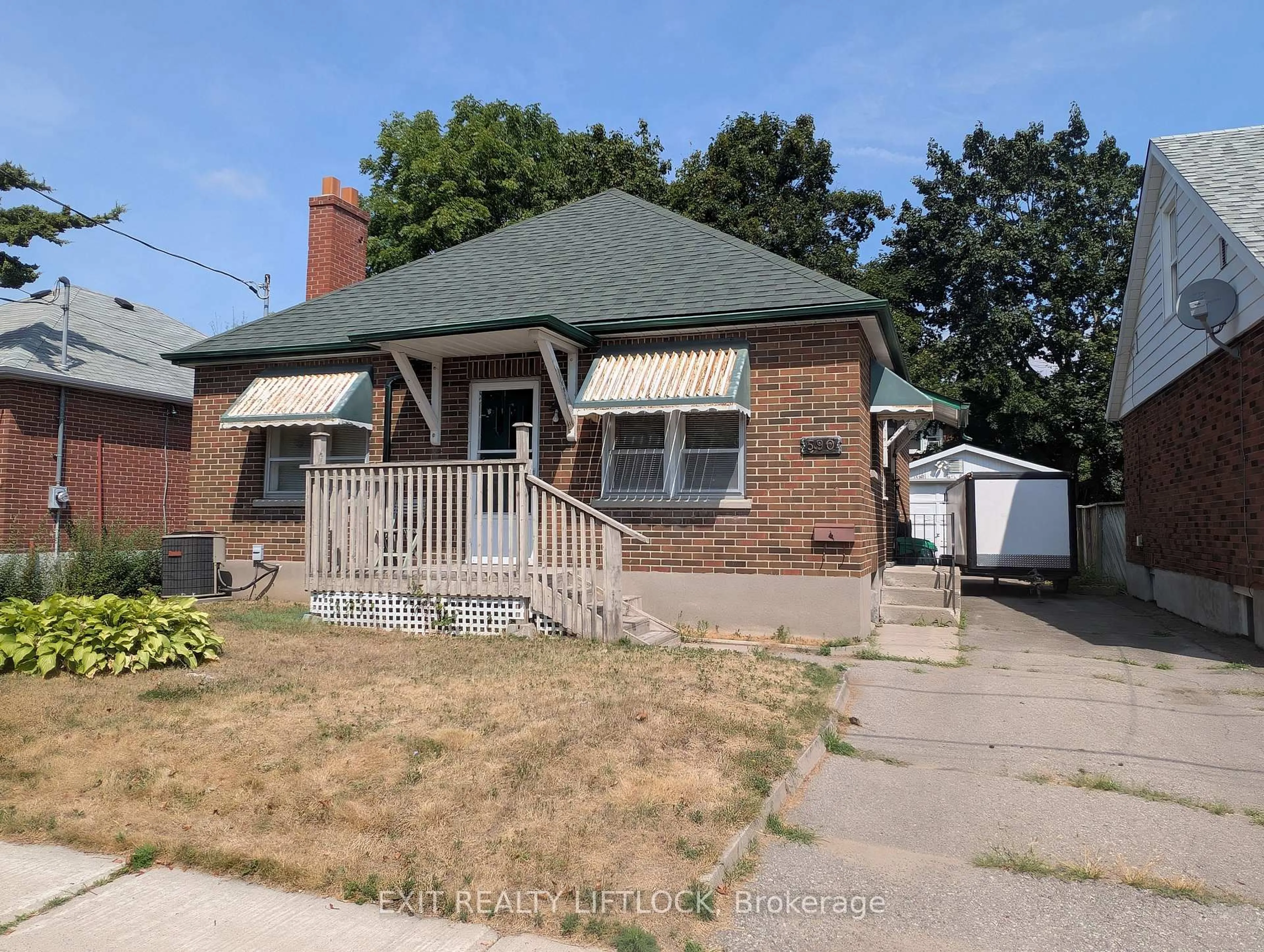 Home with brick exterior material, street for 590 Mccannan Ave, Peterborough Central Ontario K9J 4J6