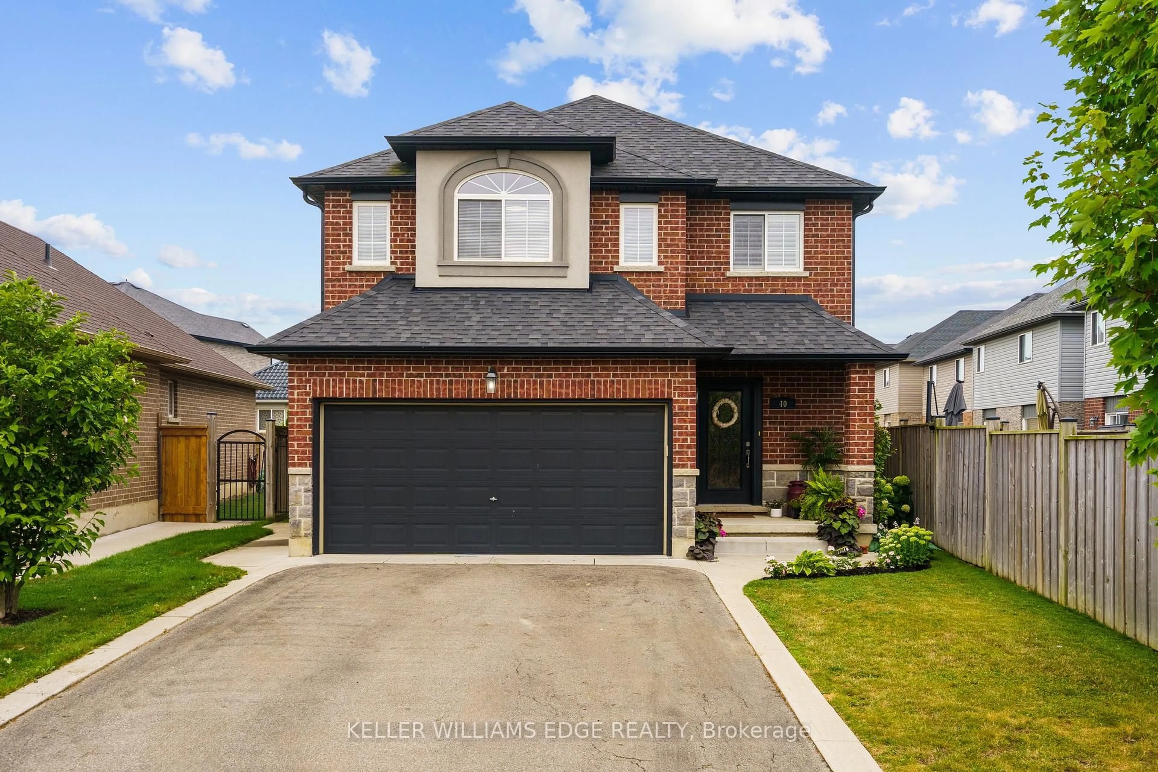 Home with brick exterior material, street for 40 Stoneglen Way, Hamilton Ontario L0R 1W0