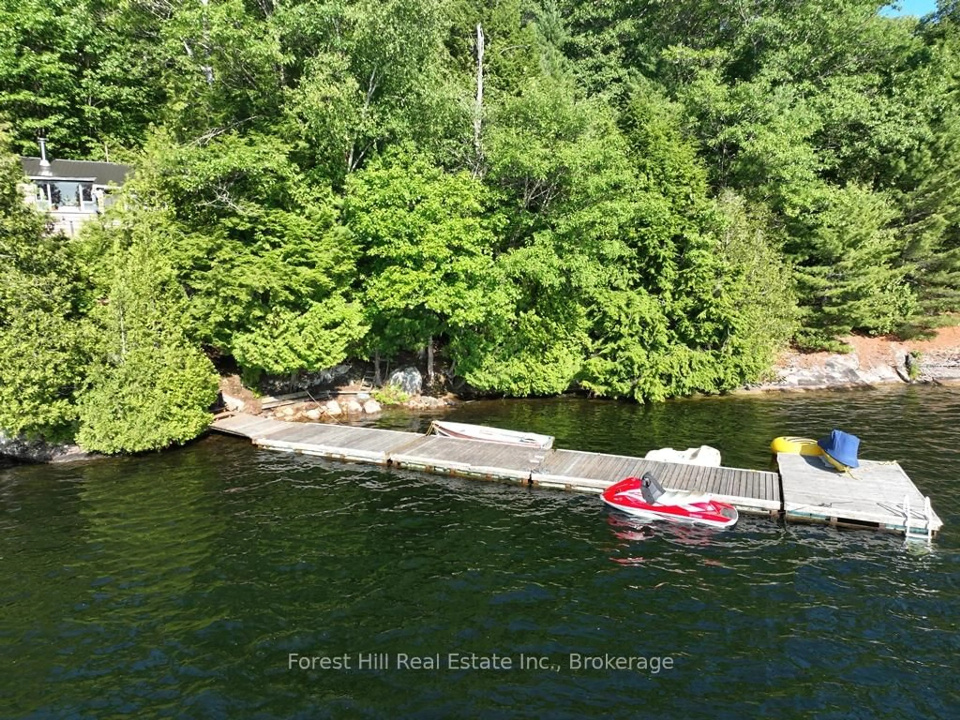 A pic from outside/outdoor area/front of a property/back of a property/a pic from drone, water/lake/river/ocean view for 10689 Kawagama Lake, Algonquin Highlands Ontario P0A 1E0