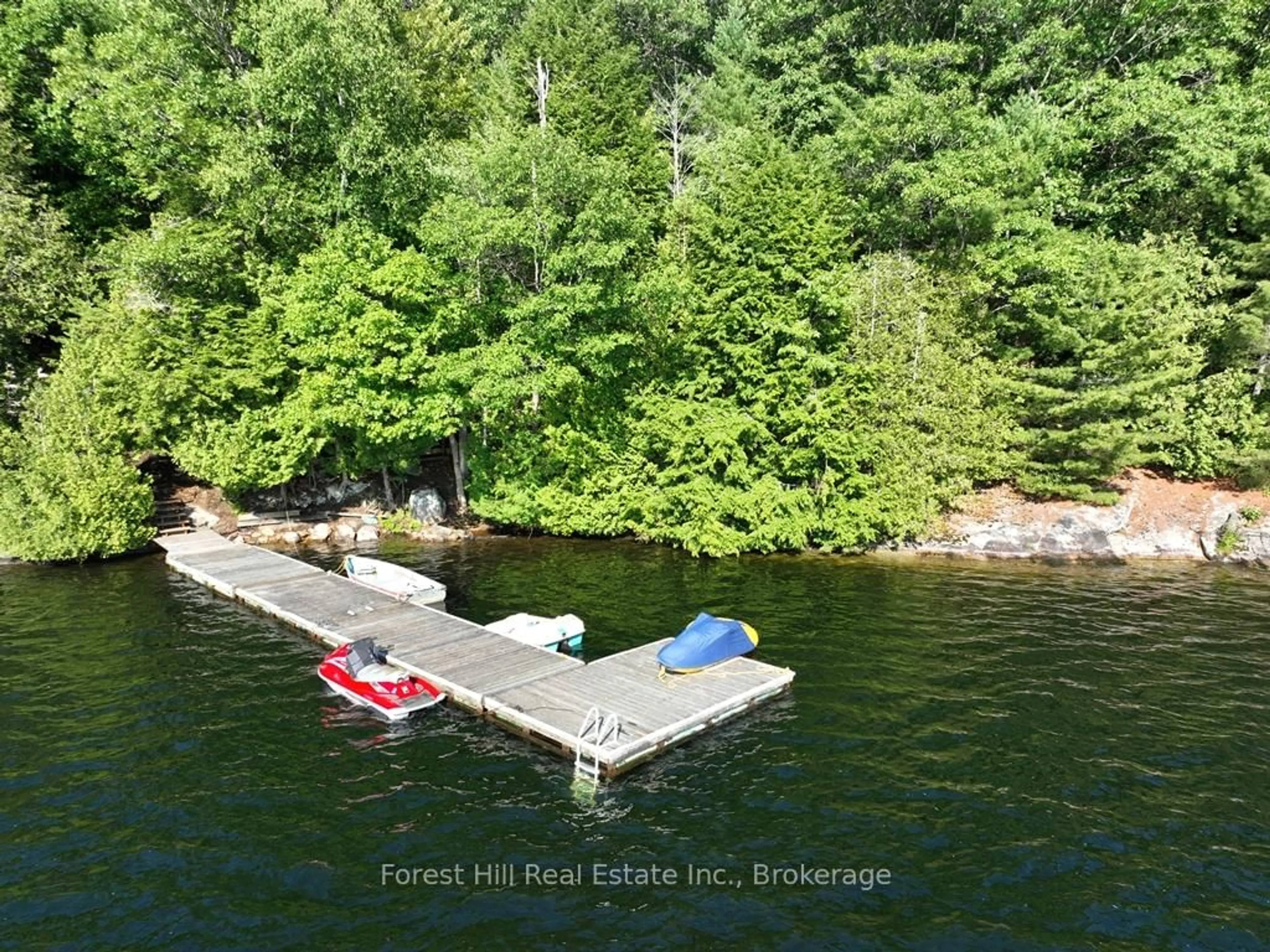 A pic from outside/outdoor area/front of a property/back of a property/a pic from drone, water/lake/river/ocean view for 10689 Kawagama Lake, Algonquin Highlands Ontario P0A 1E0