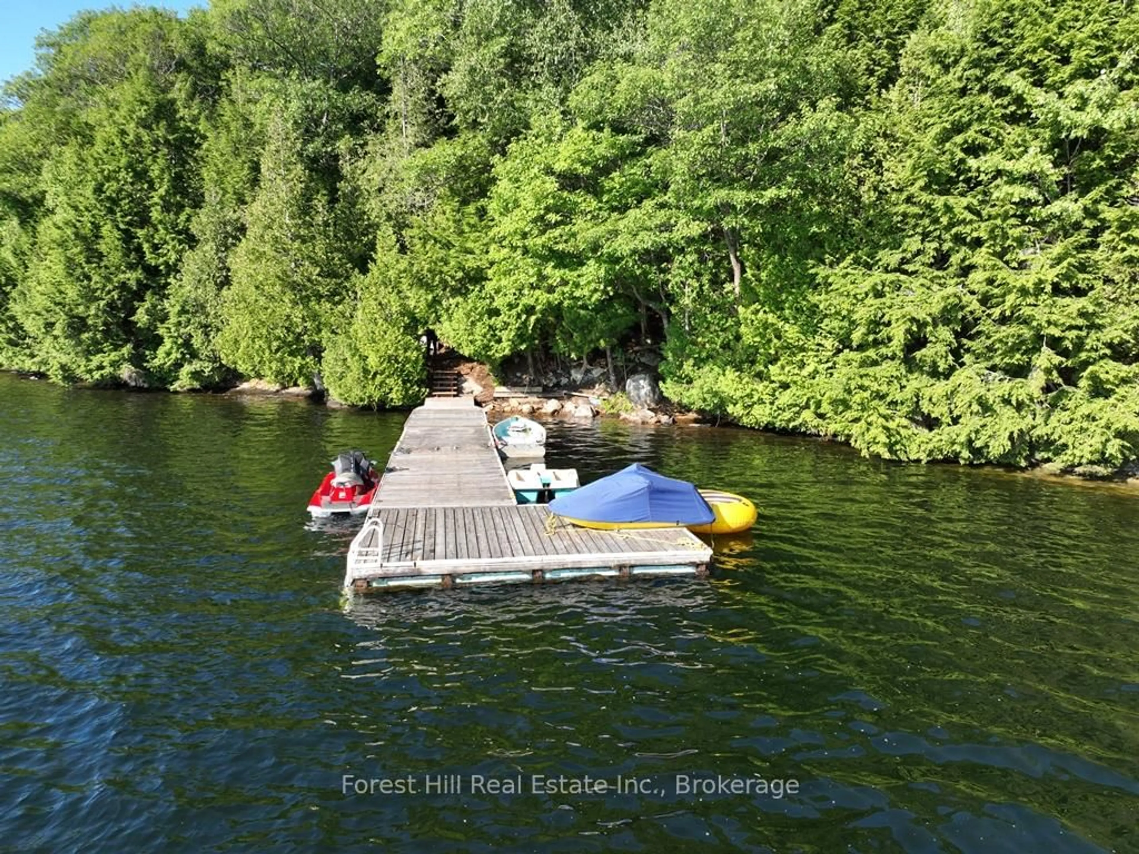 A pic from outside/outdoor area/front of a property/back of a property/a pic from drone, water/lake/river/ocean view for 10689 Kawagama Lake, Algonquin Highlands Ontario P0A 1E0