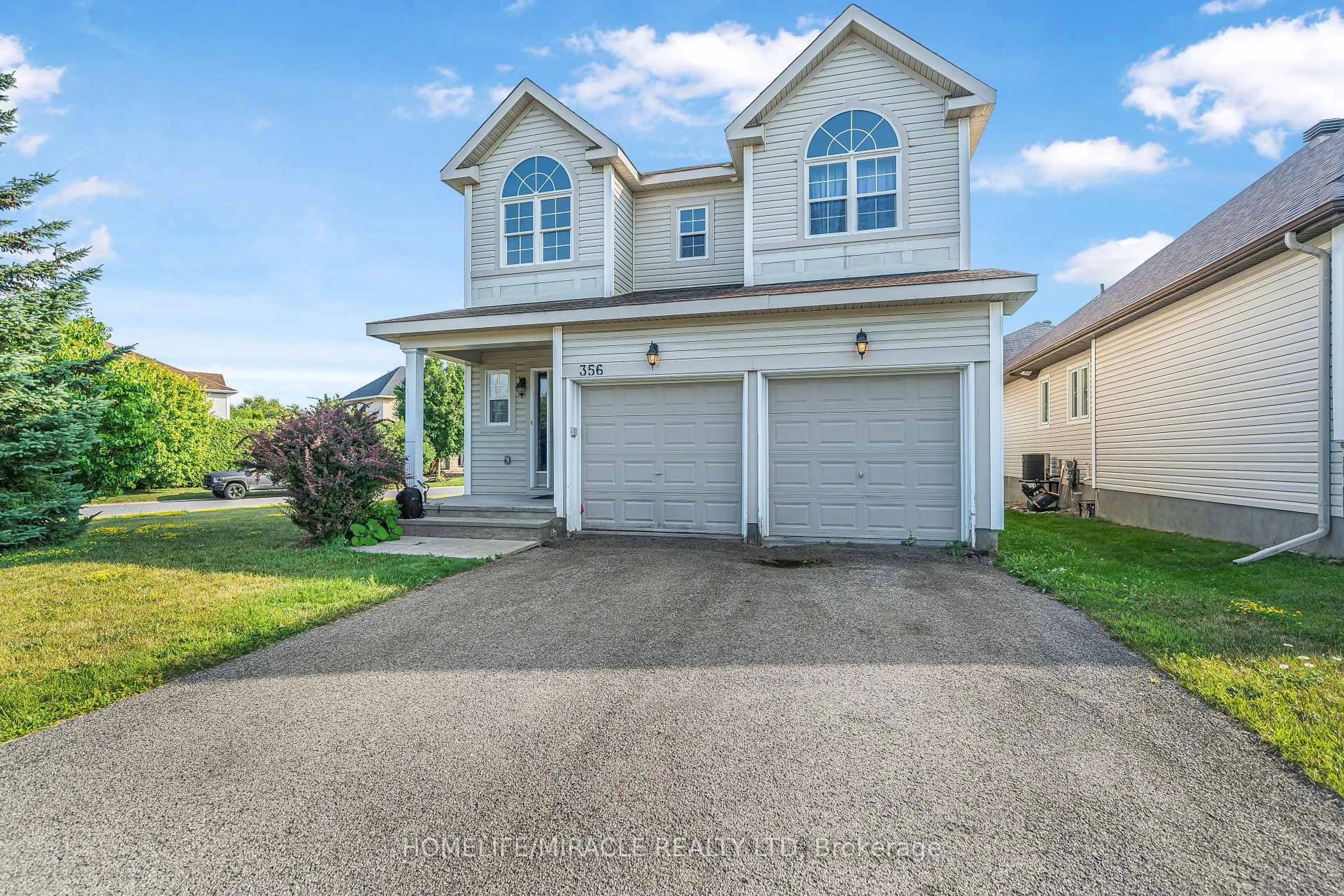 Home with vinyl exterior material, street for 356 West Ridge Dr, Stittsville Ontario K2S 2G8
