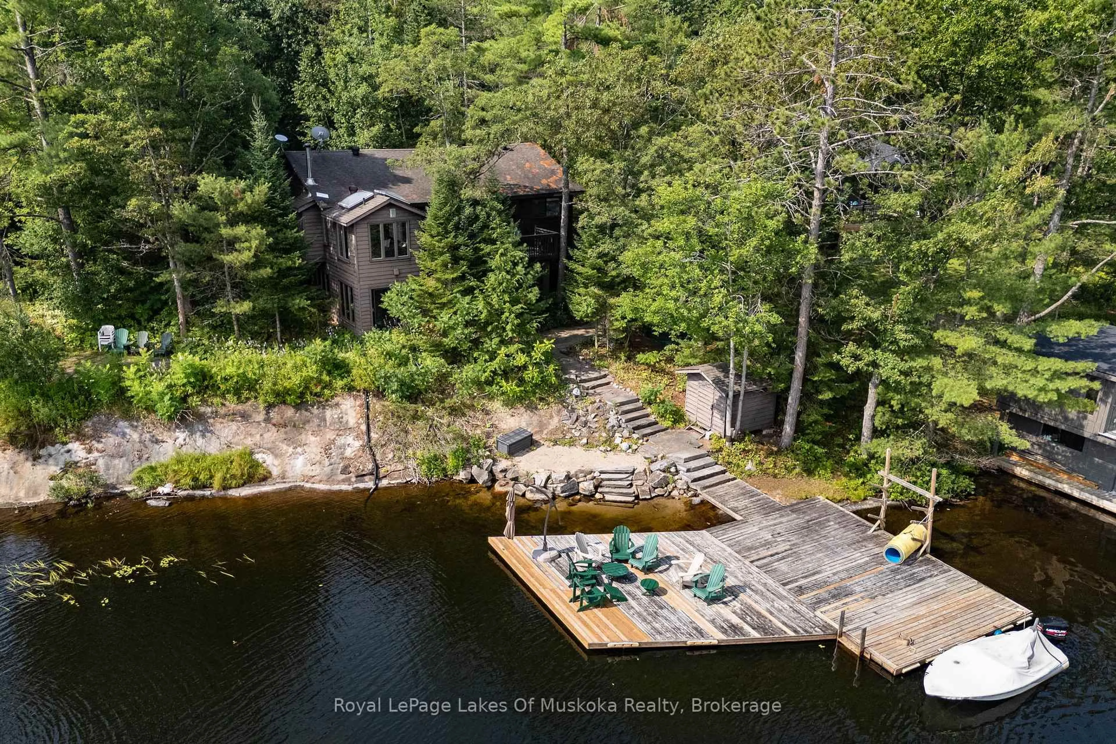 A pic from outside/outdoor area/front of a property/back of a property/a pic from drone, water/lake/river/ocean view for 51 Pinetree Rd, Gravenhurst Ontario P1P 1R2