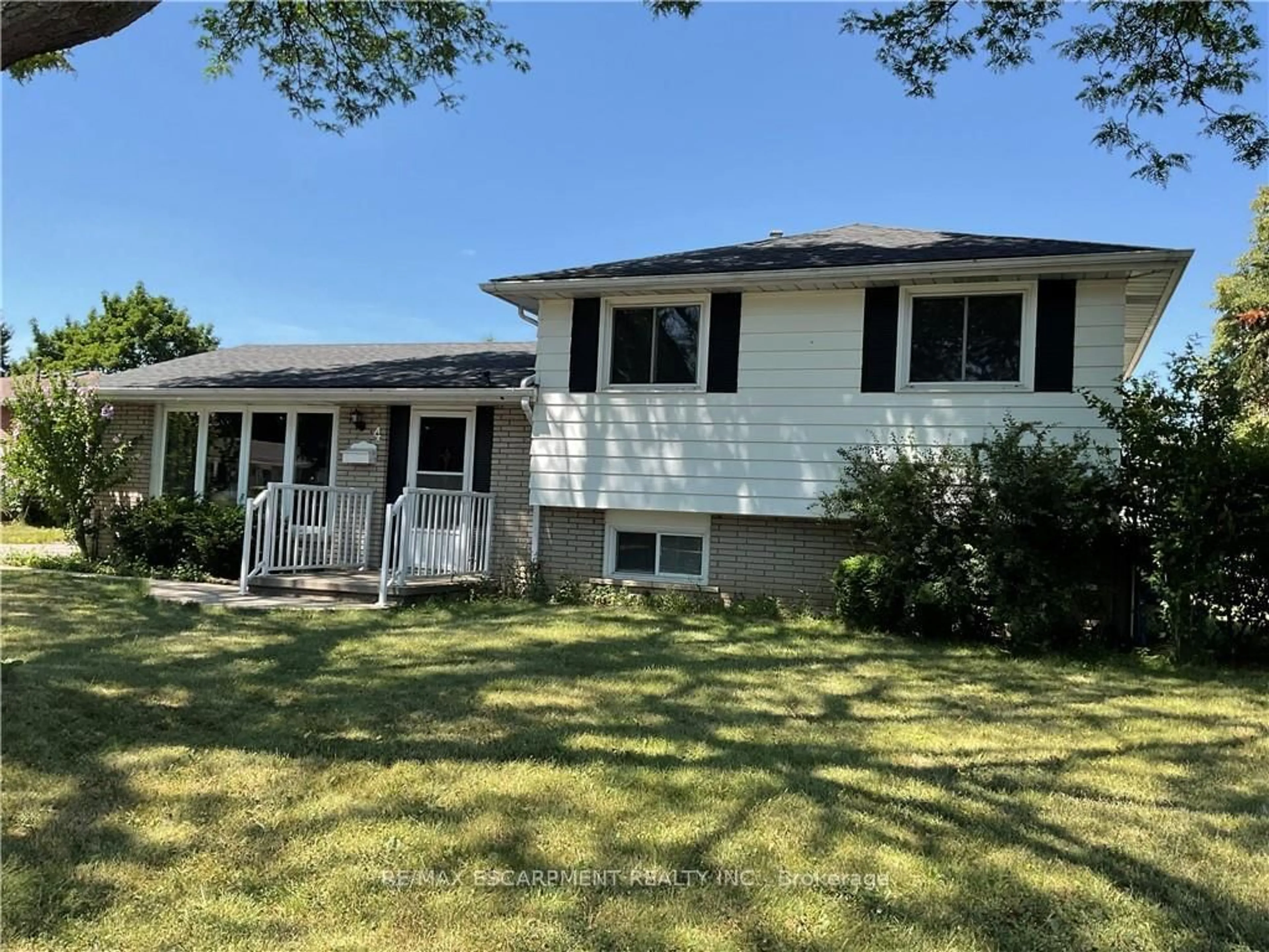 Home with vinyl exterior material, street for 4 Purnell Dr, Hamilton Ontario L9C 4X9