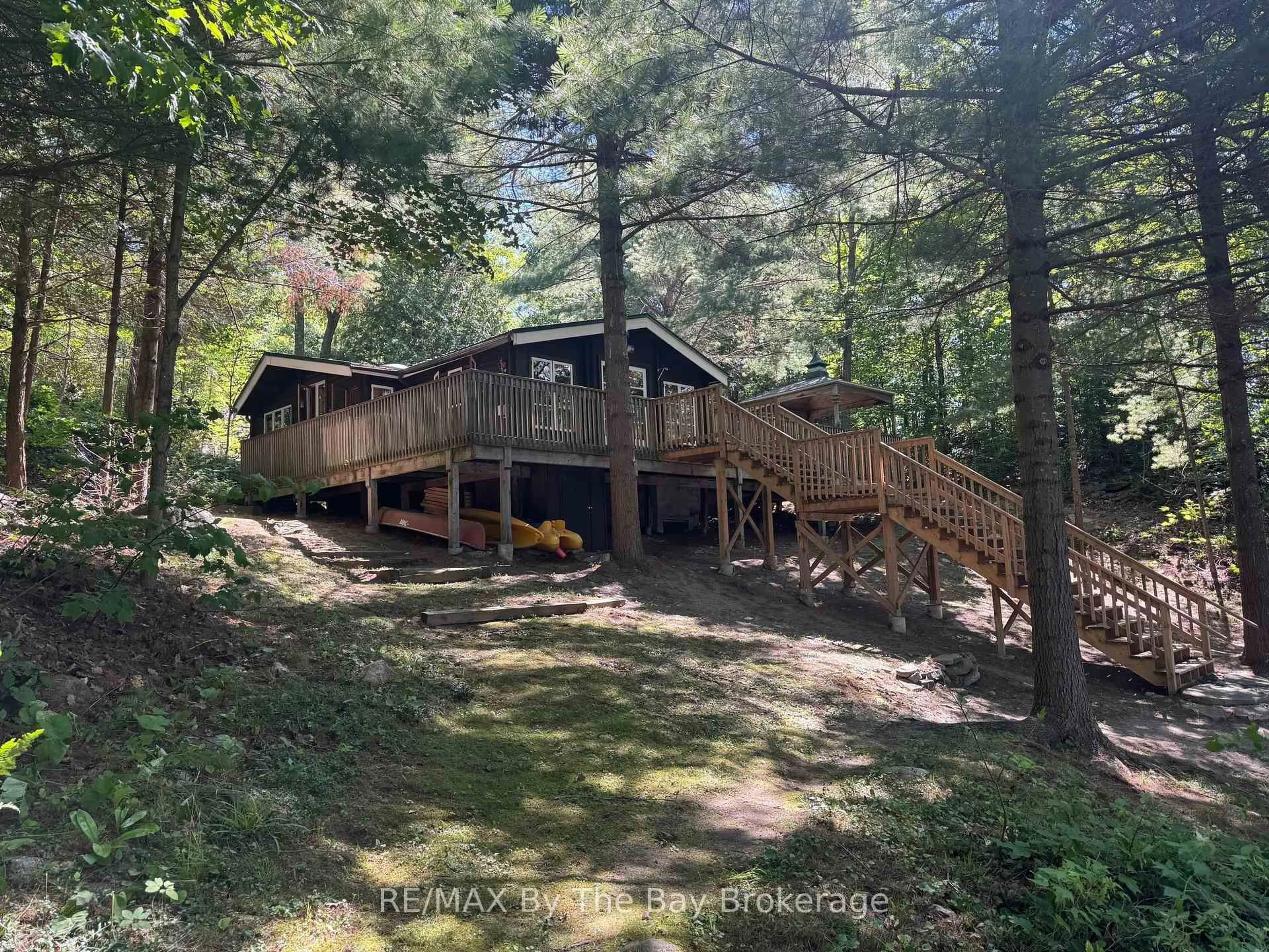 A pic from outside/outdoor area/front of a property/back of a property/a pic from drone, forest/trees view for 1177 Harrison Tr, Georgian Bay Ontario P0C 1H0