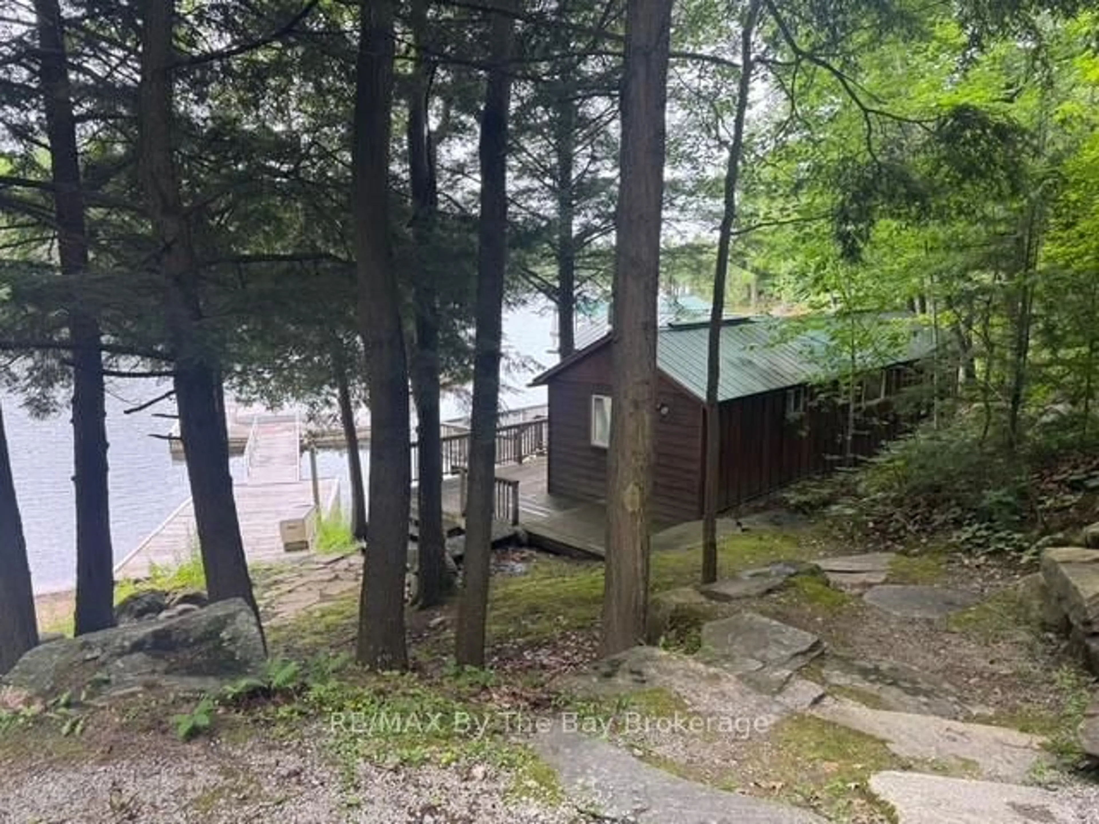 A pic from outside/outdoor area/front of a property/back of a property/a pic from drone, water/lake/river/ocean view for 1215 Harrison Tr, Georgian Bay Ontario P2A 0B7