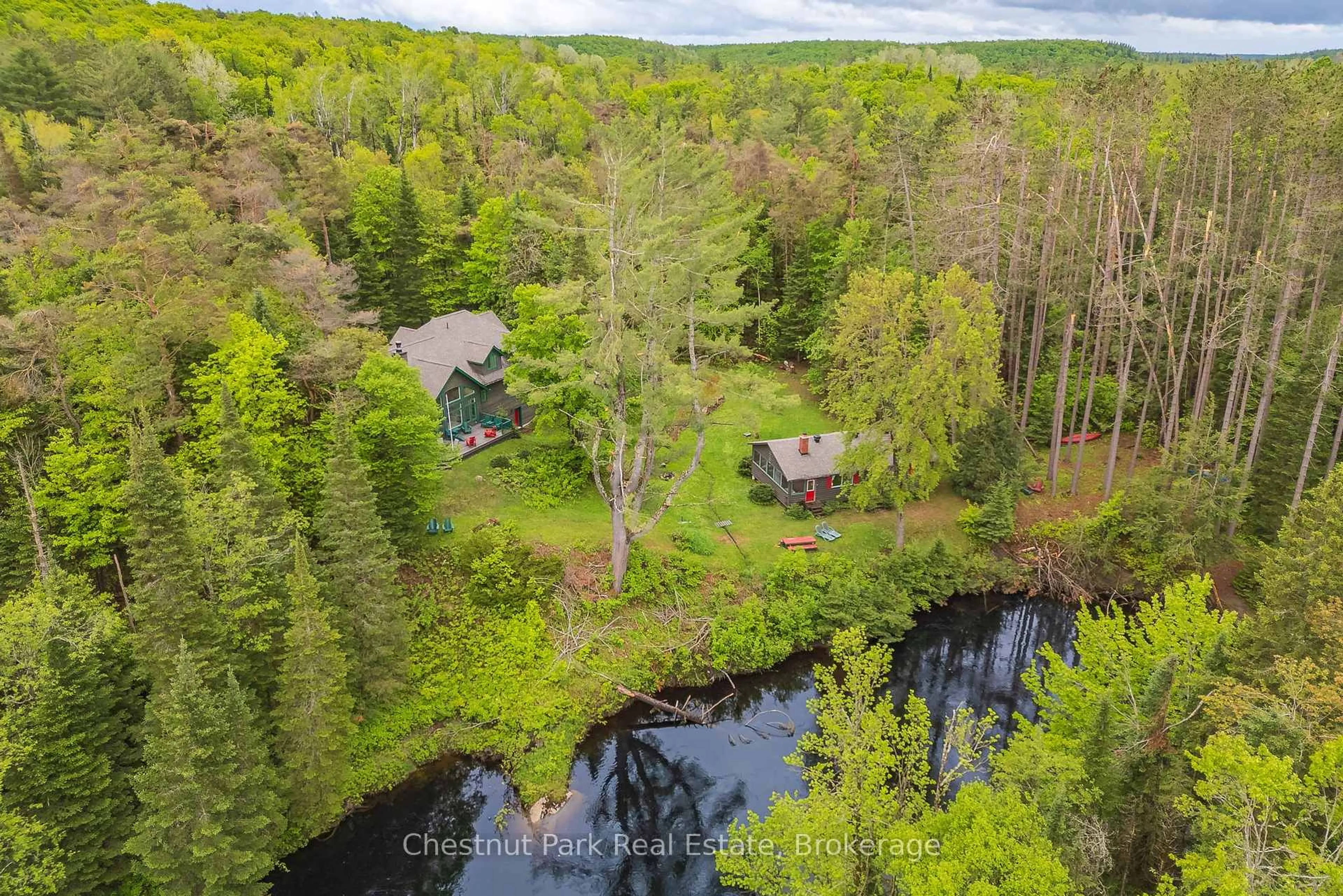 A pic from outside/outdoor area/front of a property/back of a property/a pic from drone, water/lake/river/ocean view for 1230 MIRIAM Dr #1 & 2, Bracebridge Ontario P1L 1X1