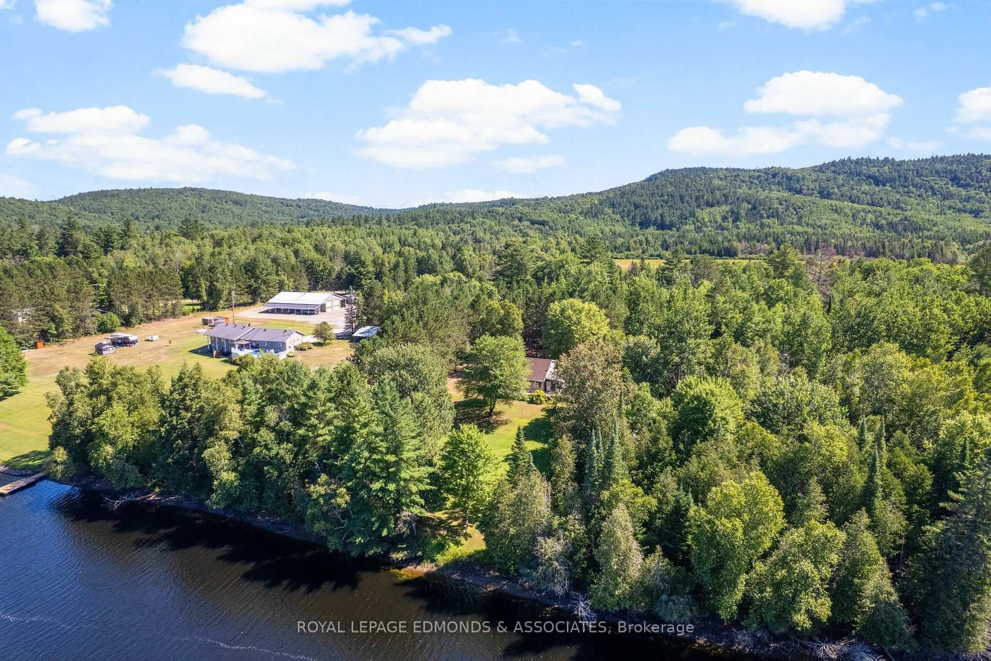 A pic from outside/outdoor area/front of a property/back of a property/a pic from drone, water/lake/river/ocean view for 36 Crescent Dr, Palmer Rapids Ontario K0J 2E0