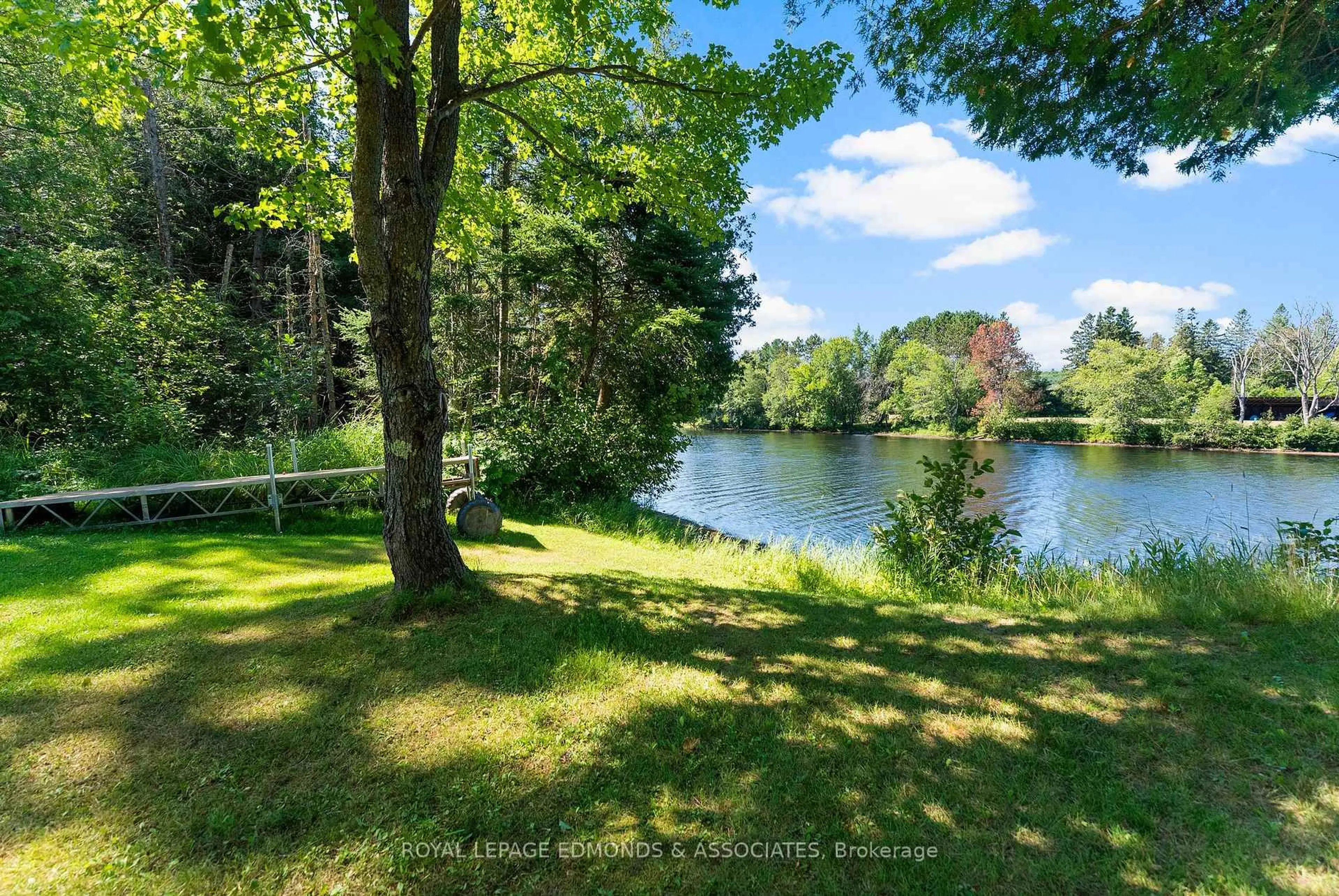 A pic from outside/outdoor area/front of a property/back of a property/a pic from drone, water/lake/river/ocean view for 36 Crescent Dr, Palmer Rapids Ontario K0J 2E0