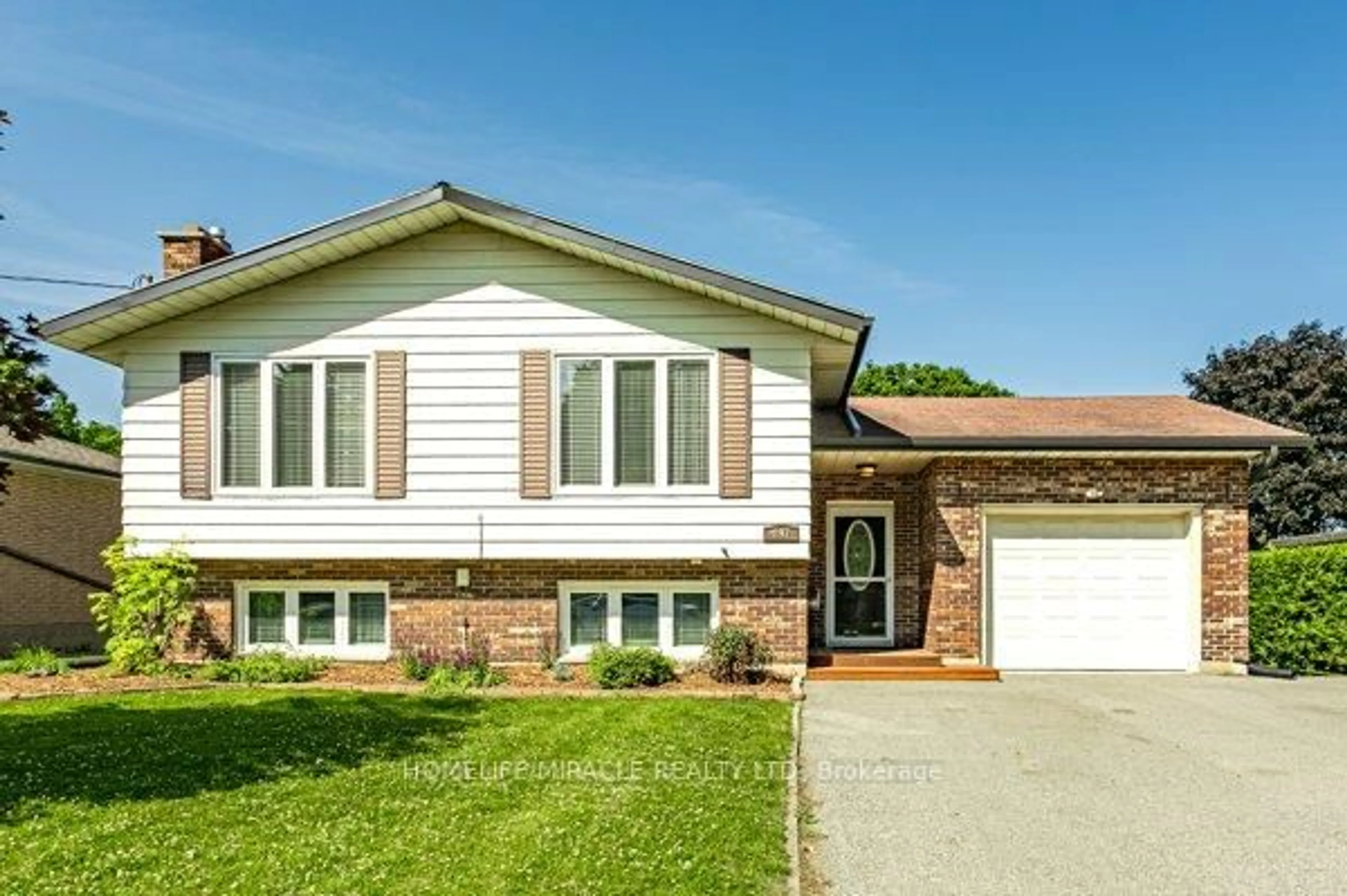 Home with vinyl exterior material, street for 297 RIDOUT St, West Elgin Ontario N0L 2C0