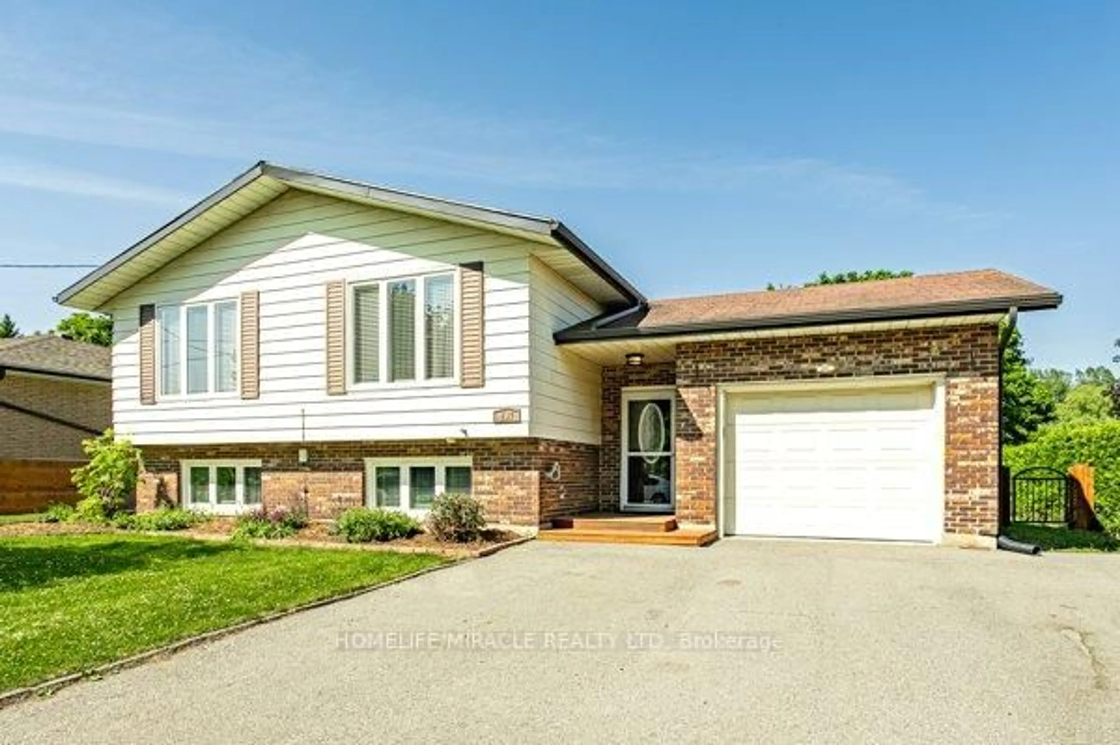 Home with vinyl exterior material, street for 297 RIDOUT St, West Elgin Ontario N0L 2C0