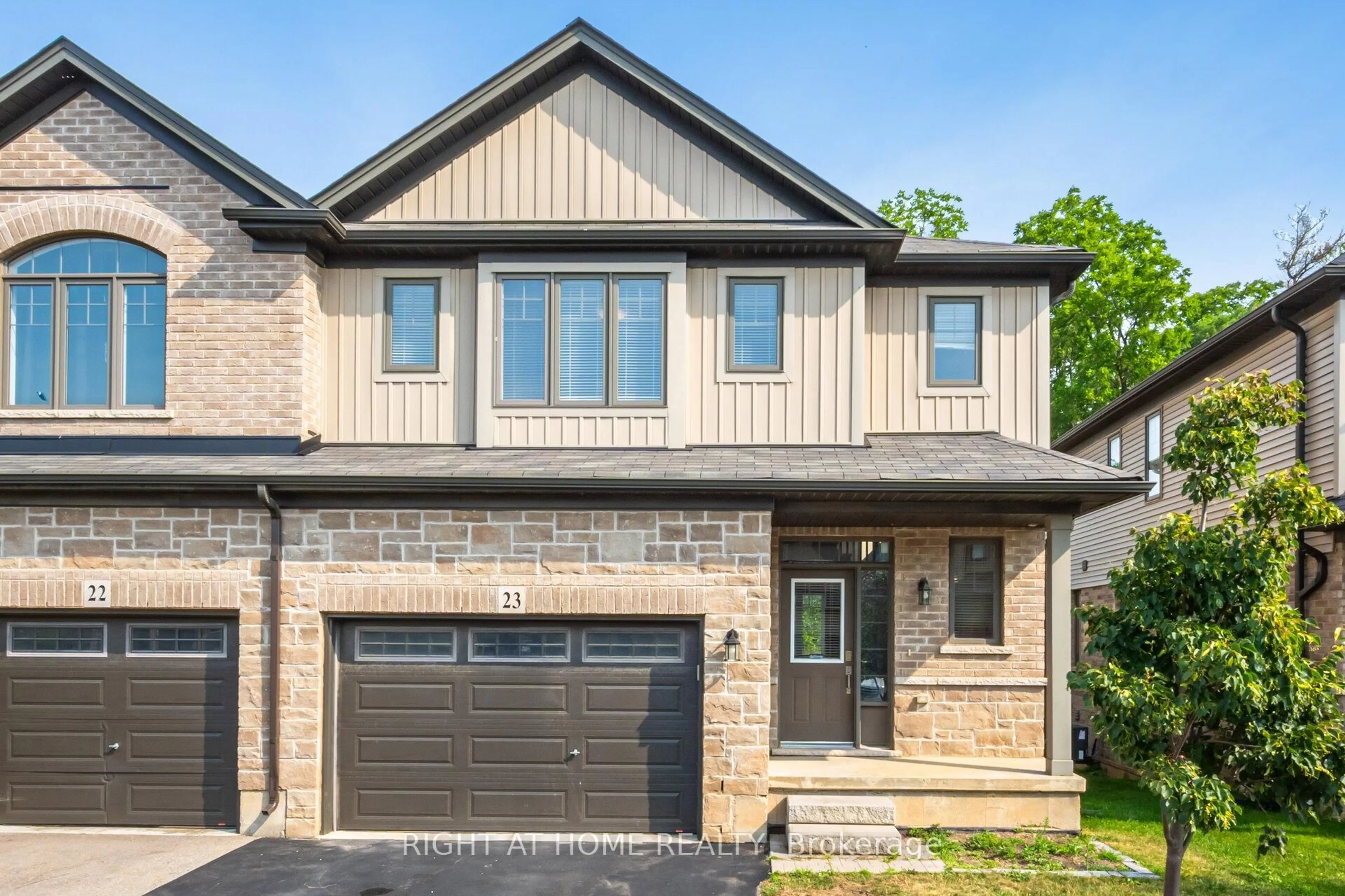 Home with brick exterior material, street for 1 Tom Brown Dr #23, Brant Ontario N3L 0H8