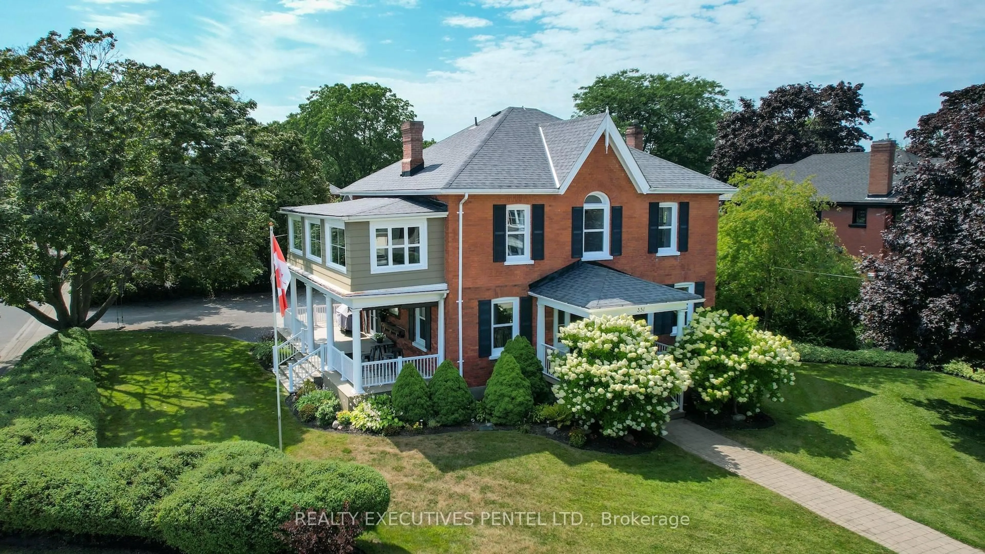 A pic from outside/outdoor area/front of a property/back of a property/a pic from drone, unknown for 351 George St. St, Cobourg Ontario K9A 3M2