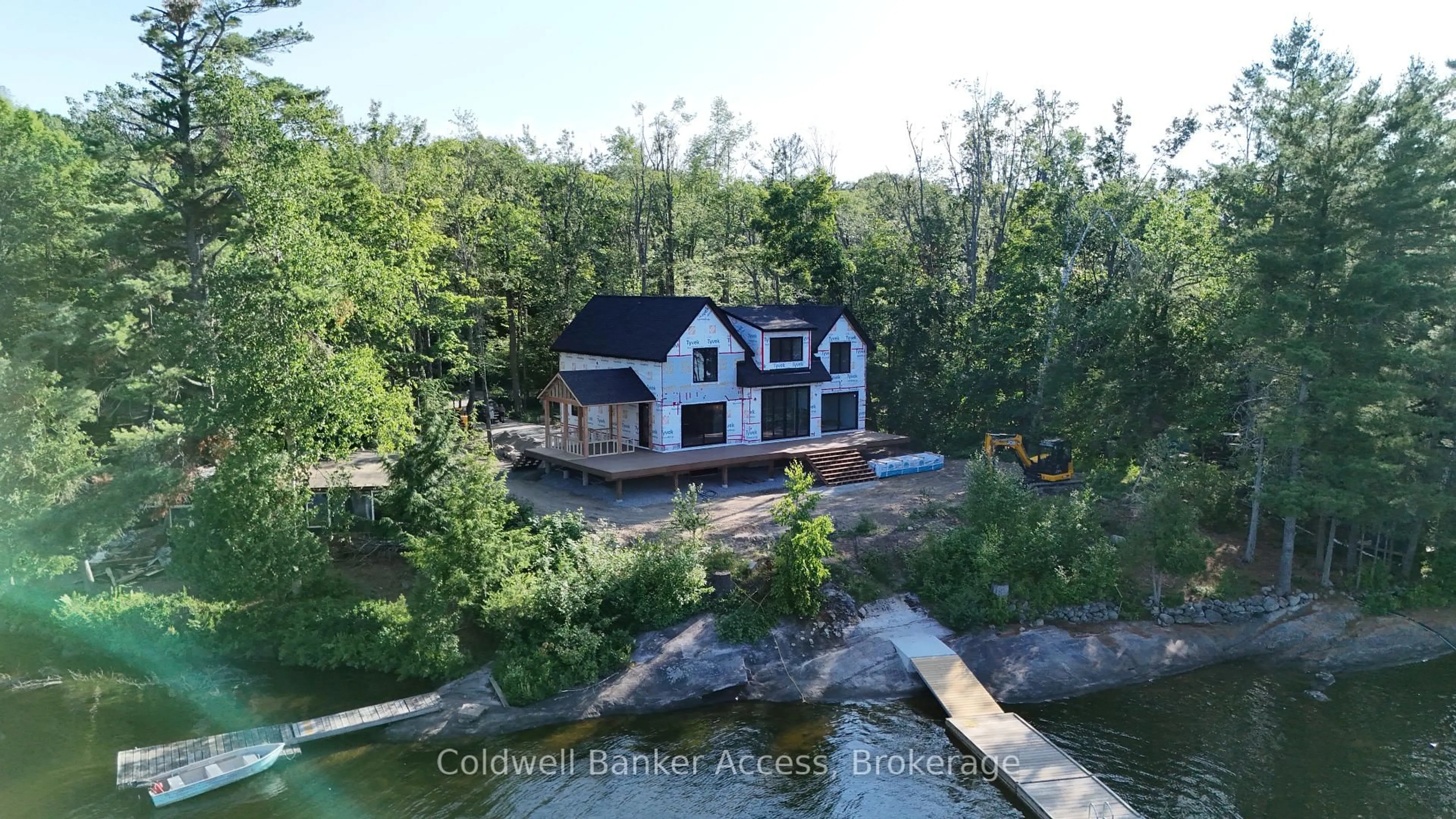 A pic from outside/outdoor area/front of a property/back of a property/a pic from drone, water/lake/river/ocean view for 1031 Lionel Ave, Muskoka Lakes Ontario P0C 1A0