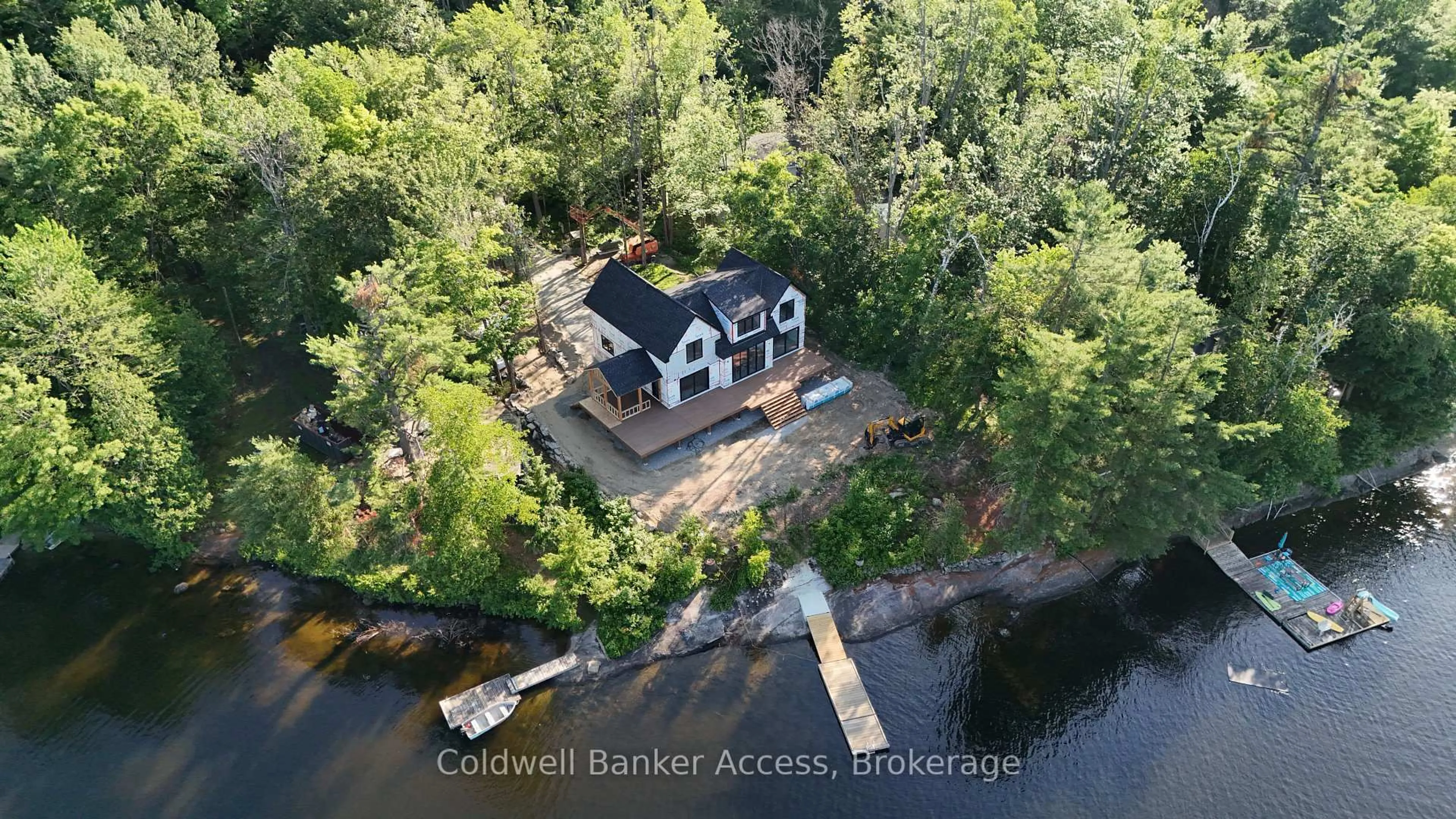 A pic from outside/outdoor area/front of a property/back of a property/a pic from drone, water/lake/river/ocean view for 1031 Lionel Ave, Muskoka Lakes Ontario P0C 1A0