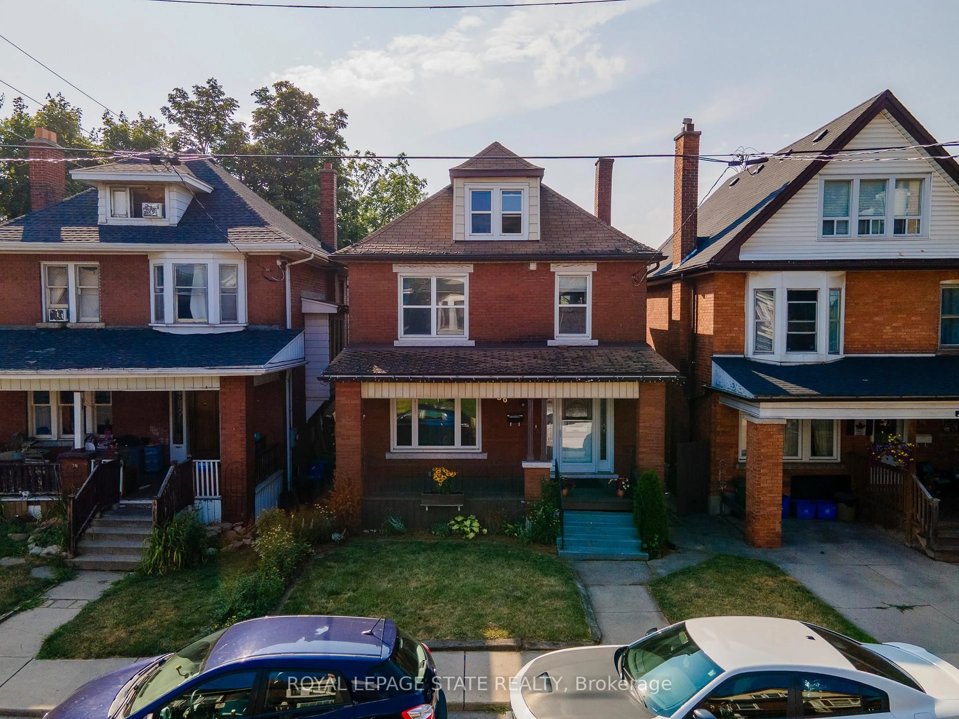 A pic from outside/outdoor area/front of a property/back of a property/a pic from drone, street for 36 Spadina Ave, Hamilton Ontario L8M 2W9