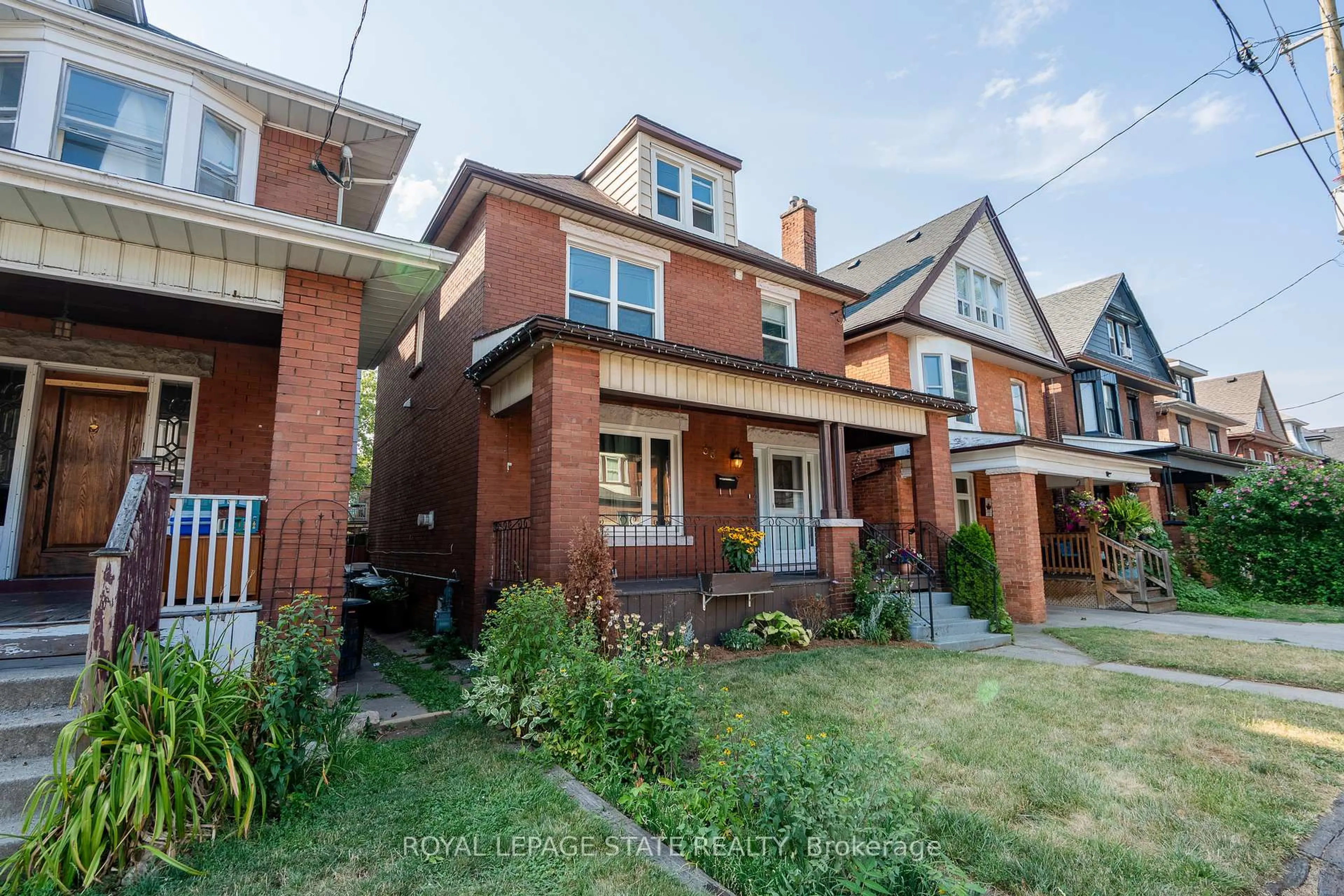 Home with brick exterior material, street for 36 Spadina Ave, Hamilton Ontario L8M 2W9