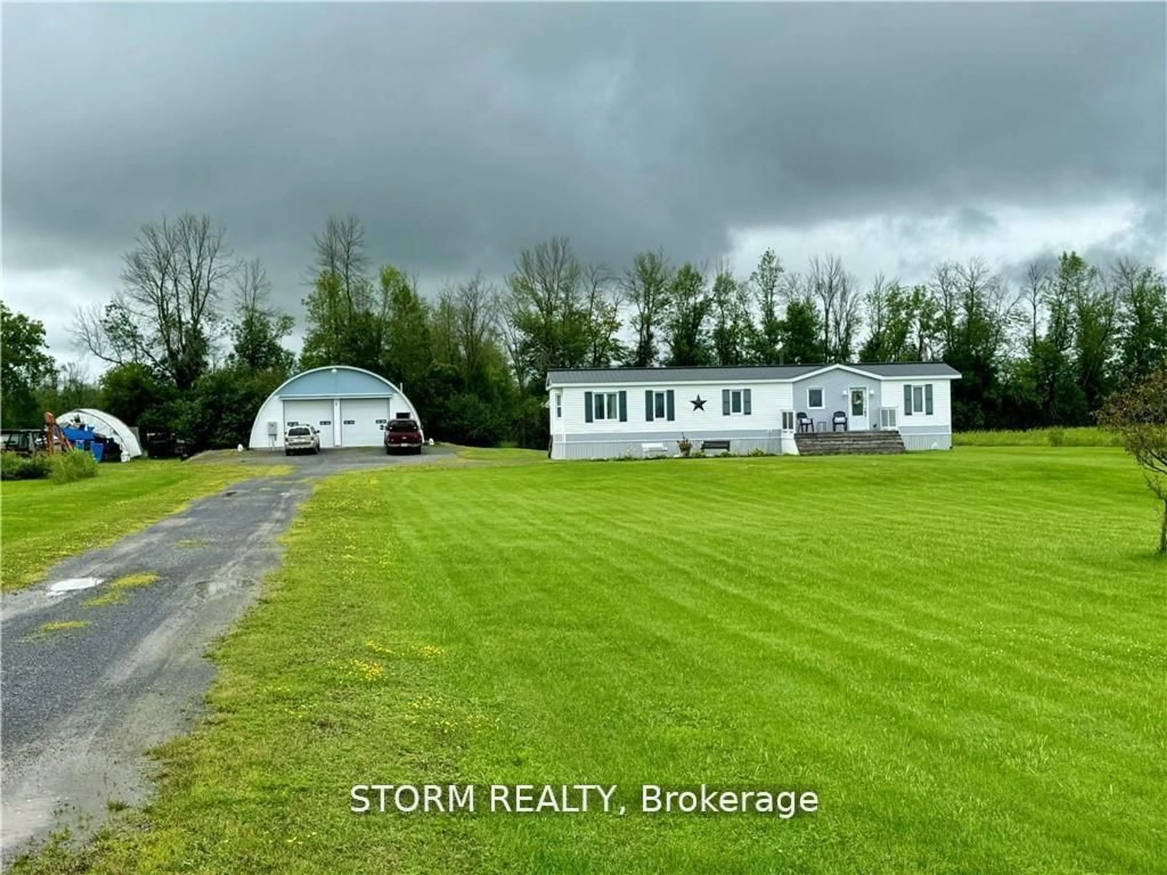 A pic from outside/outdoor area/front of a property/back of a property/a pic from drone, street for 4905 Archer Rd, South Dundas Ontario K0C 1M0