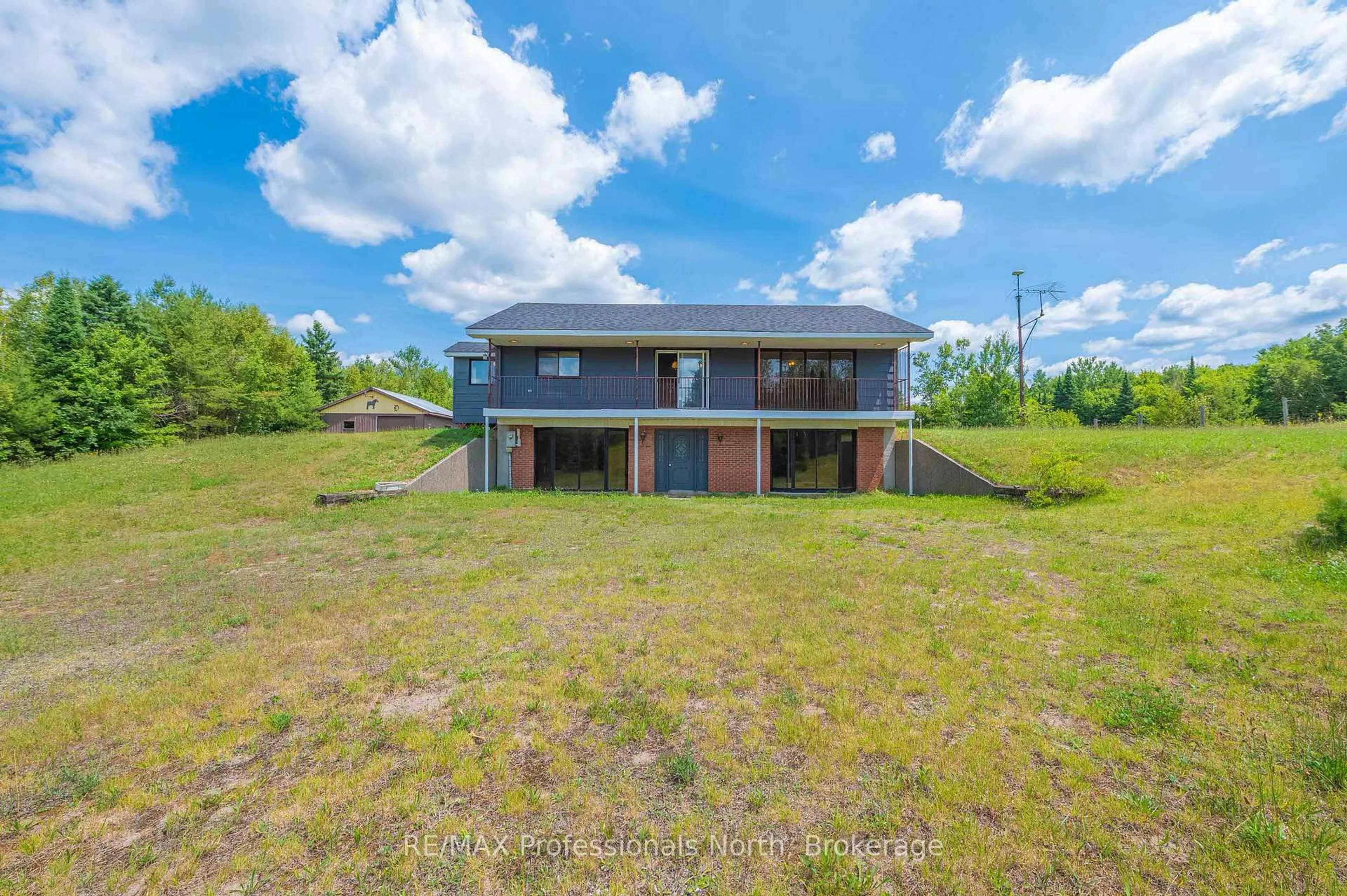 A pic from outside/outdoor area/front of a property/back of a property/a pic from drone, building for 3204 Gelert Rd, Minden Hills Ontario K0M 2K0