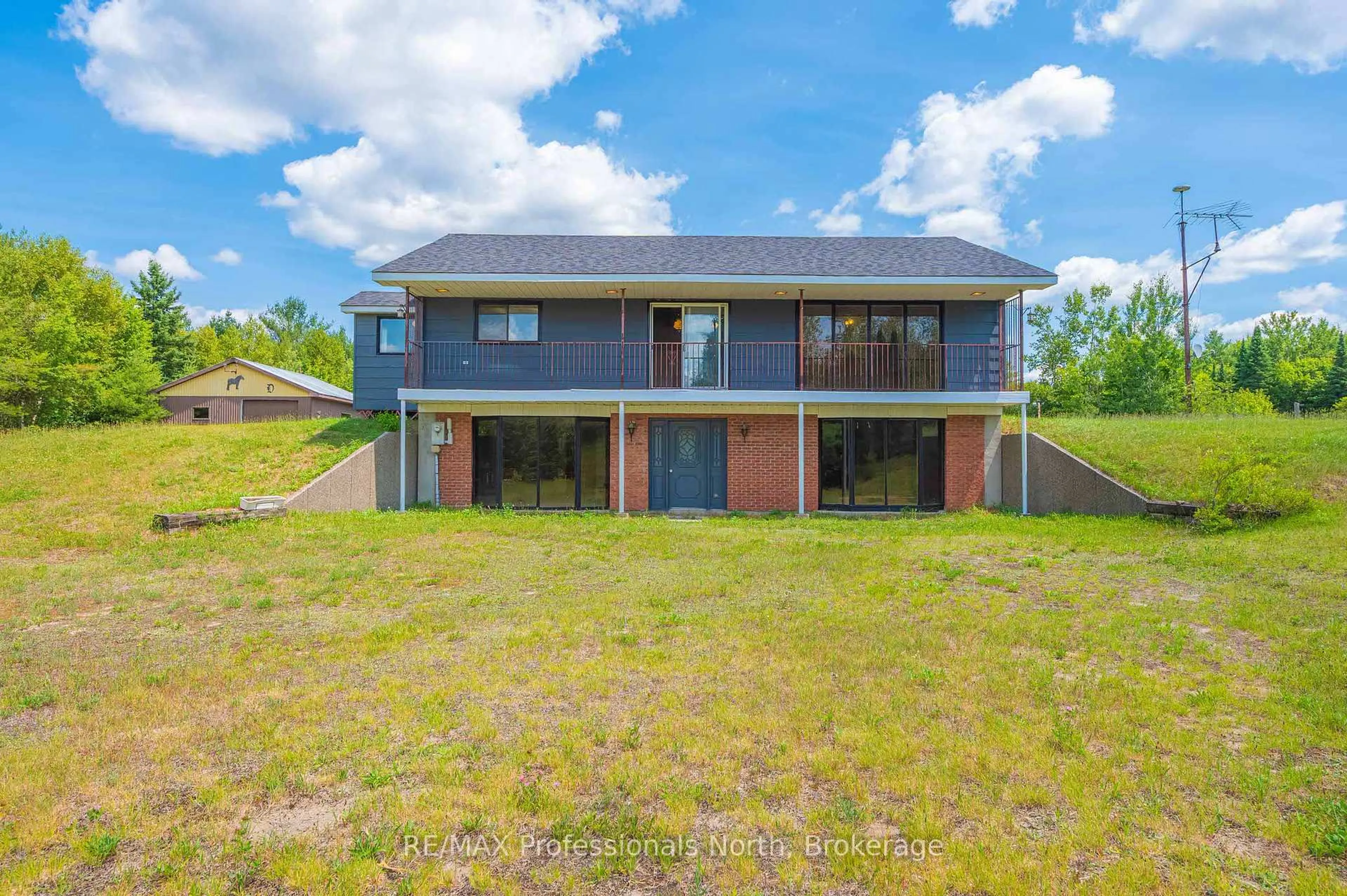 A pic from outside/outdoor area/front of a property/back of a property/a pic from drone, unknown for 3204 Gelert Rd, Minden Hills Ontario K0M 2K0