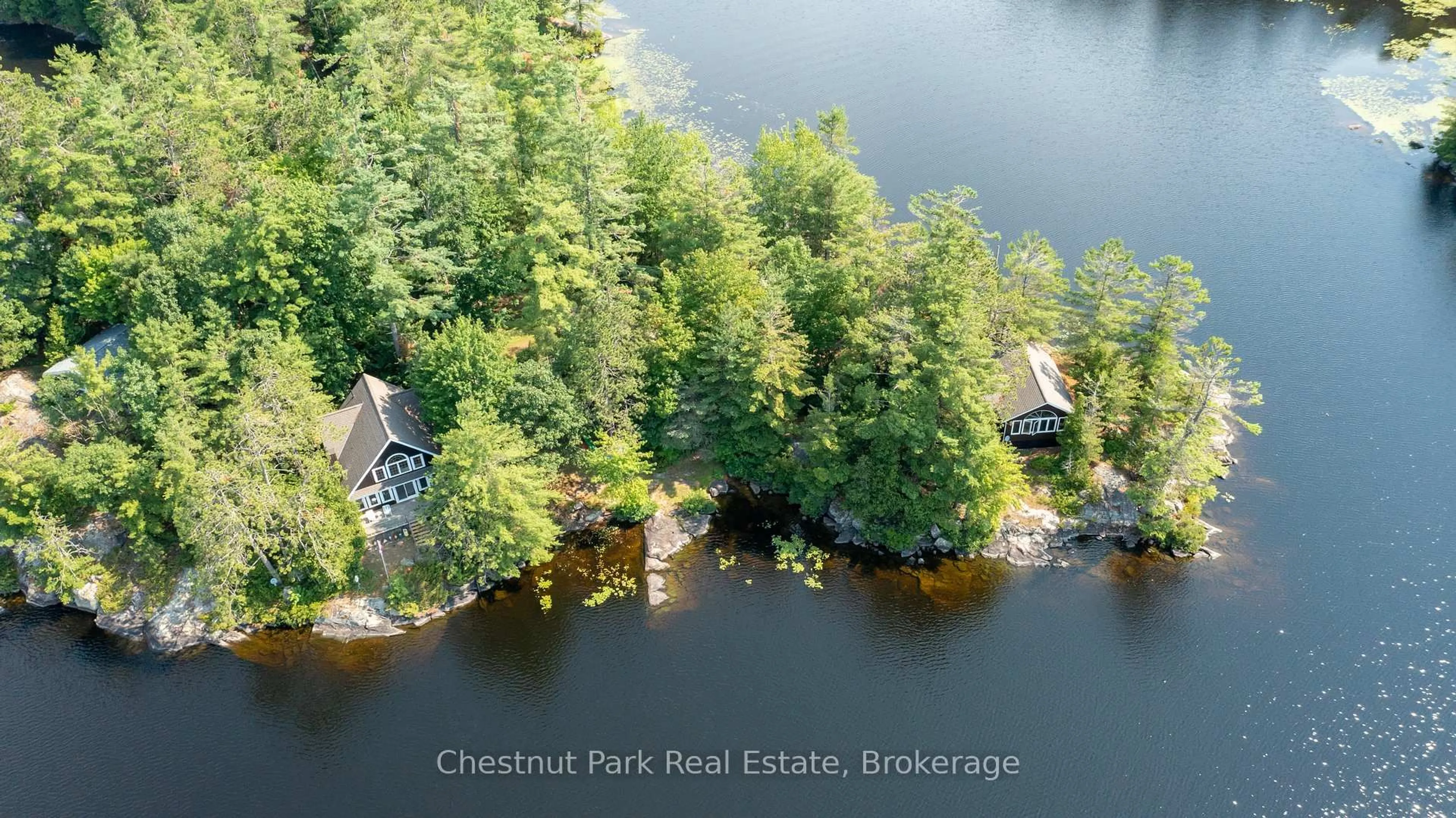 A pic from outside/outdoor area/front of a property/back of a property/a pic from drone, water/lake/river/ocean view for 1037 Fire Route 20G, Gravenhurst Ontario P1P 1R3
