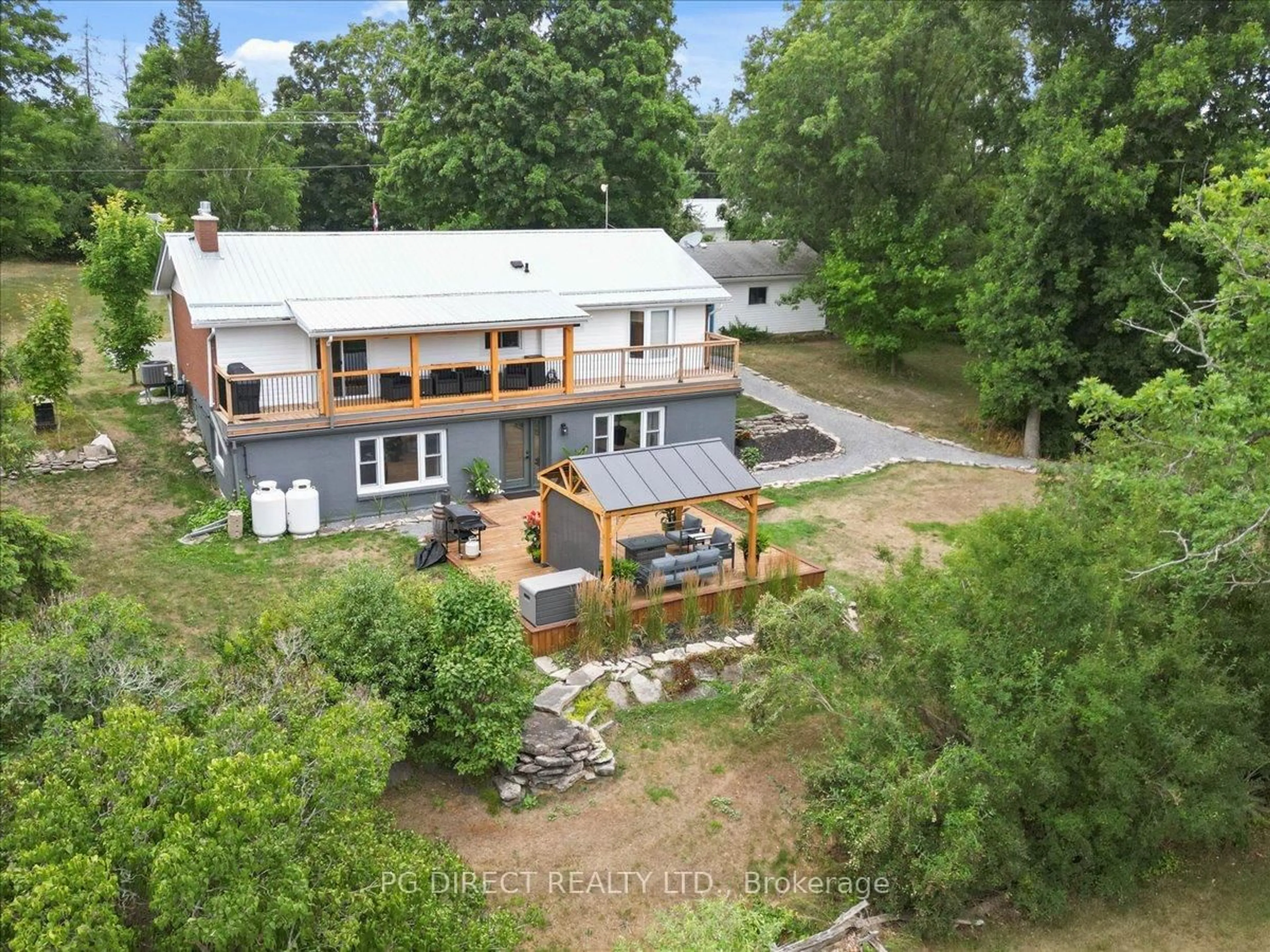 A pic from outside/outdoor area/front of a property/back of a property/a pic from drone, unknown for 2256 County Rd 8 Rd, Prince Edward County Ontario K0K 2T0