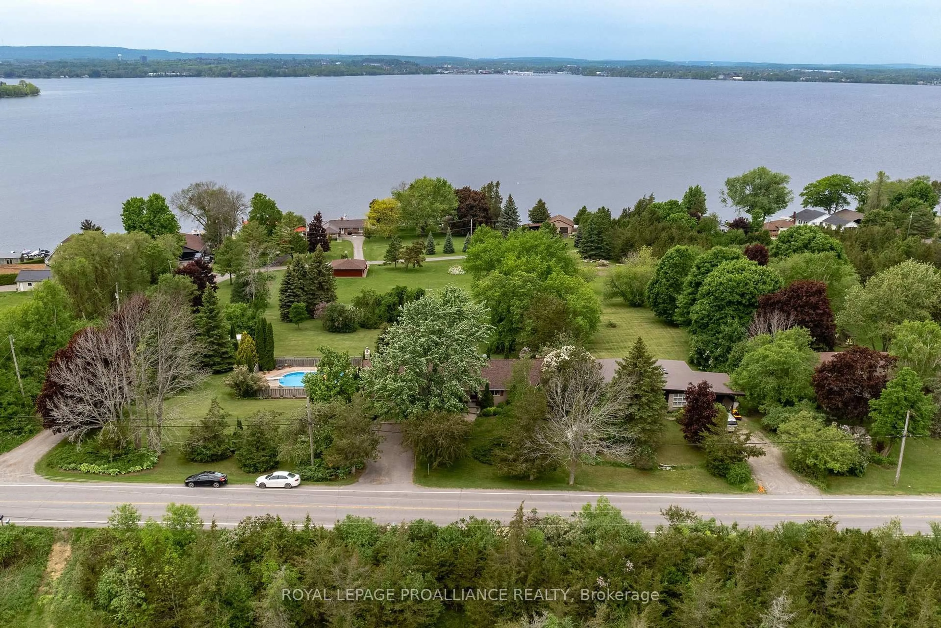 A pic from outside/outdoor area/front of a property/back of a property/a pic from drone, water/lake/river/ocean view for 3286 County Rd 3 Rd, Prince Edward County Ontario K0K 1L0