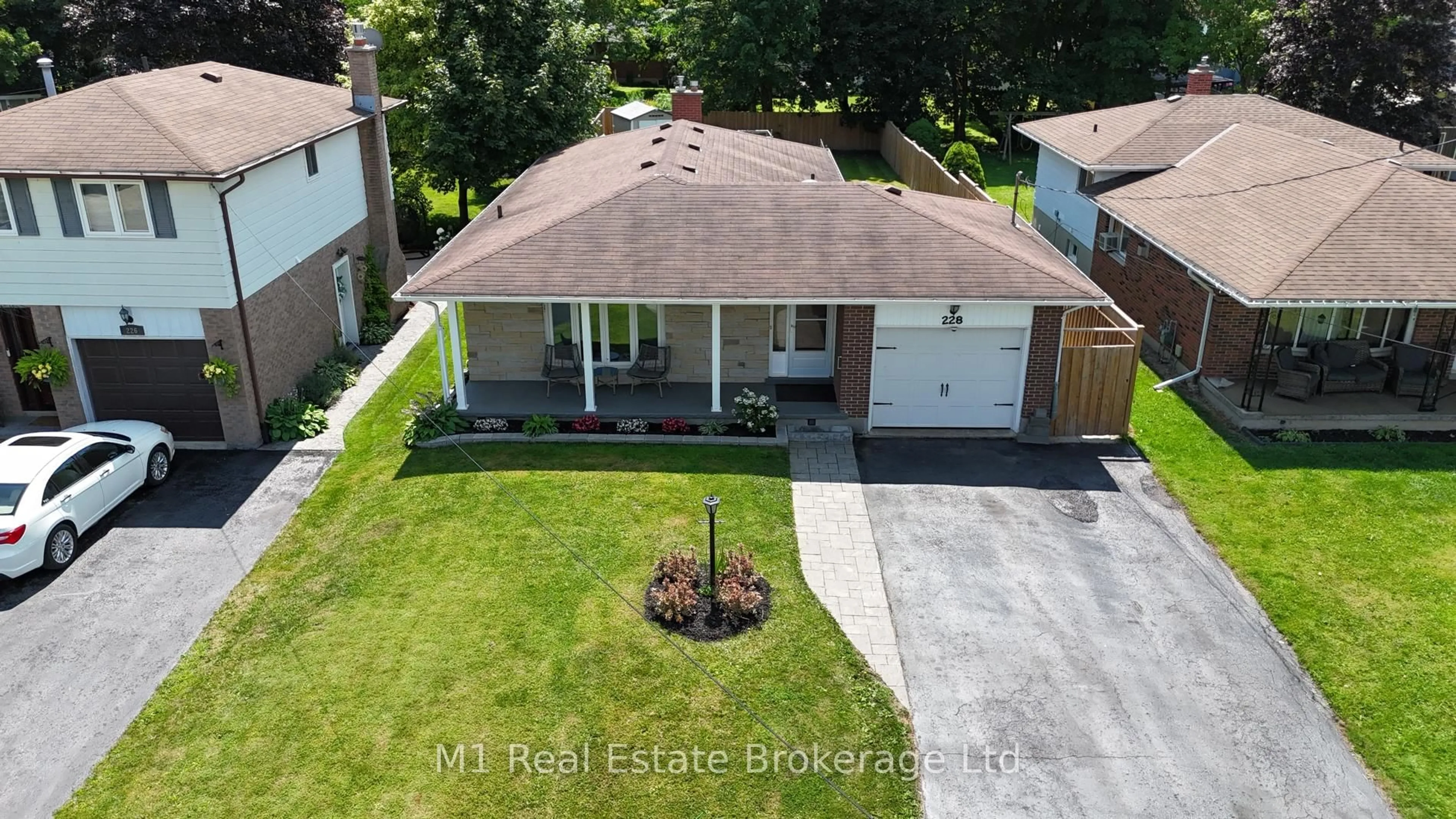 A pic from outside/outdoor area/front of a property/back of a property/a pic from drone, street for 228 Adelaide St, Wellington North Ontario N0G 1A0