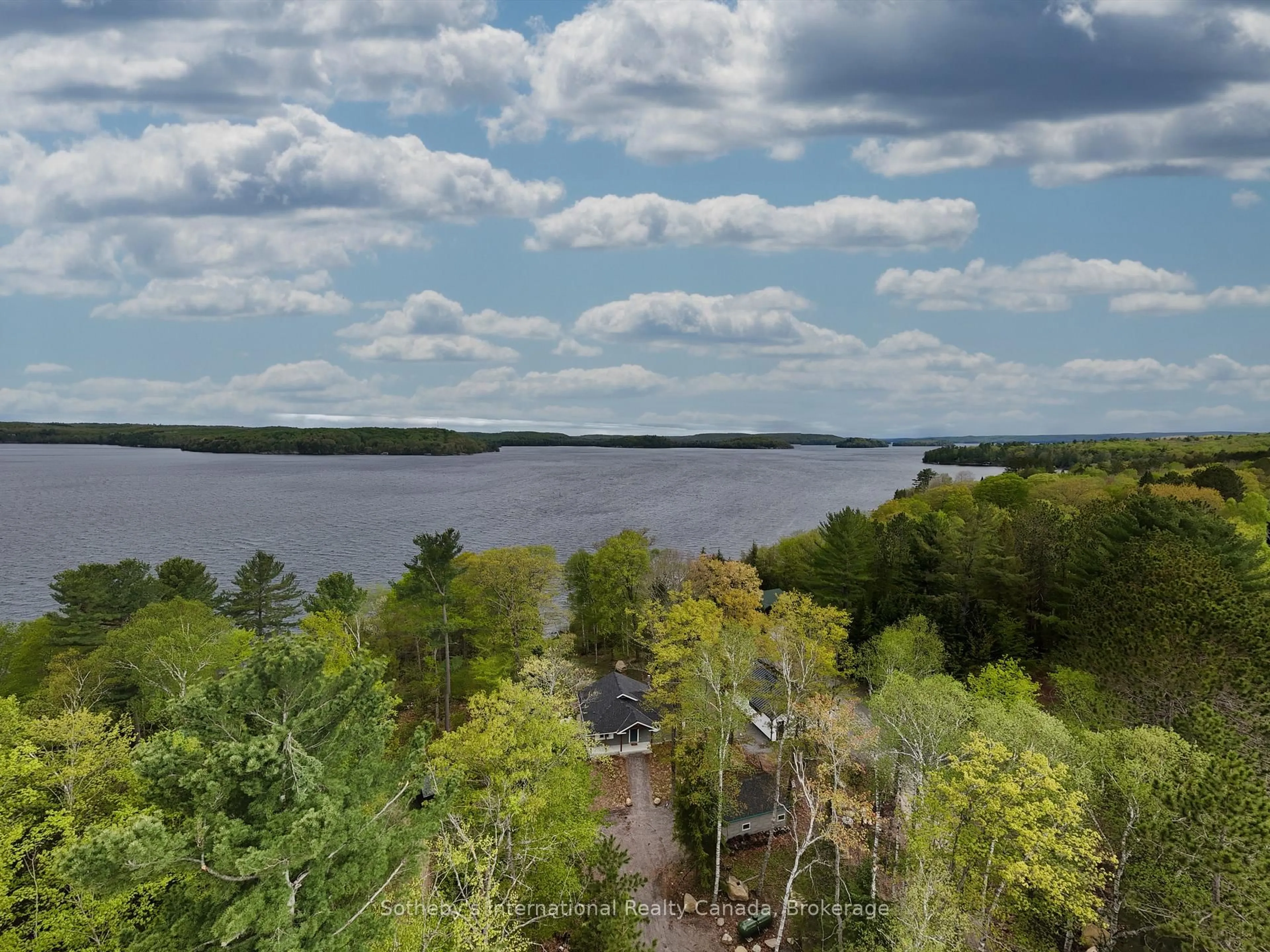A pic from outside/outdoor area/front of a property/back of a property/a pic from drone, water/lake/river/ocean view for 3179 Muskoka Rd 117 Rd #2, Lake of Bays Ontario P0B 1A0