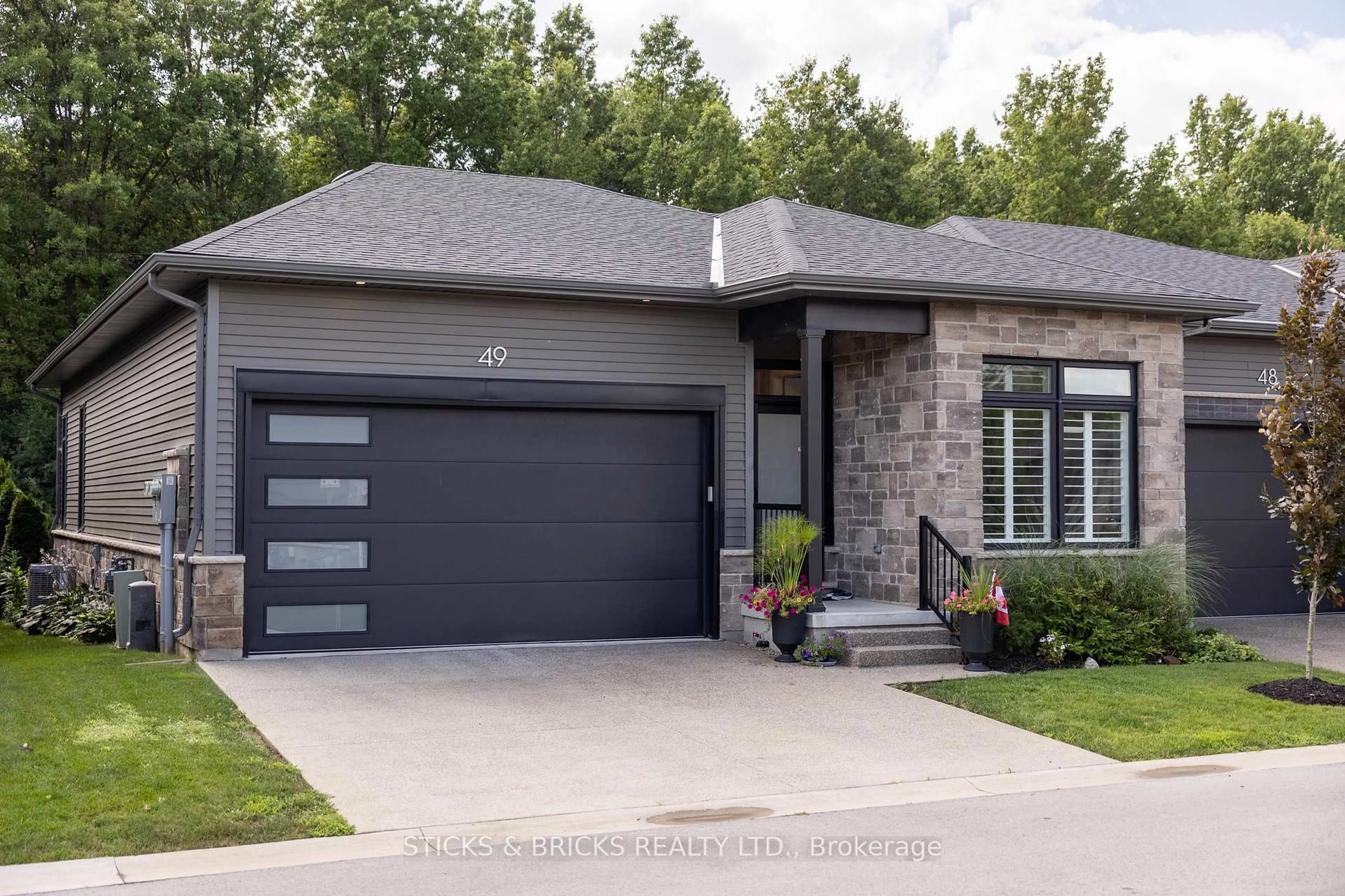 Home with brick exterior material, street for 8974 Willoughby Dr #49, Niagara Falls Ontario L2J 0Y8