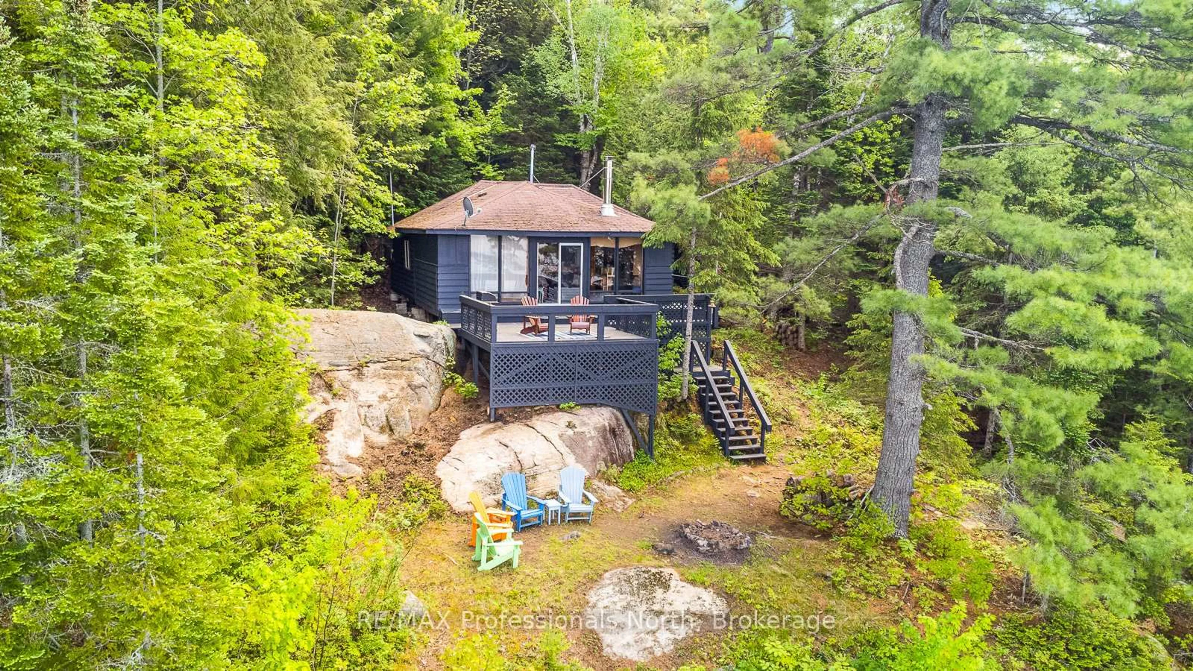 A pic from outside/outdoor area/front of a property/back of a property/a pic from drone, water/lake/river/ocean view for 11443 KUSHOG NORTH WATER, Algonquin Highlands Ontario K0M 1J2