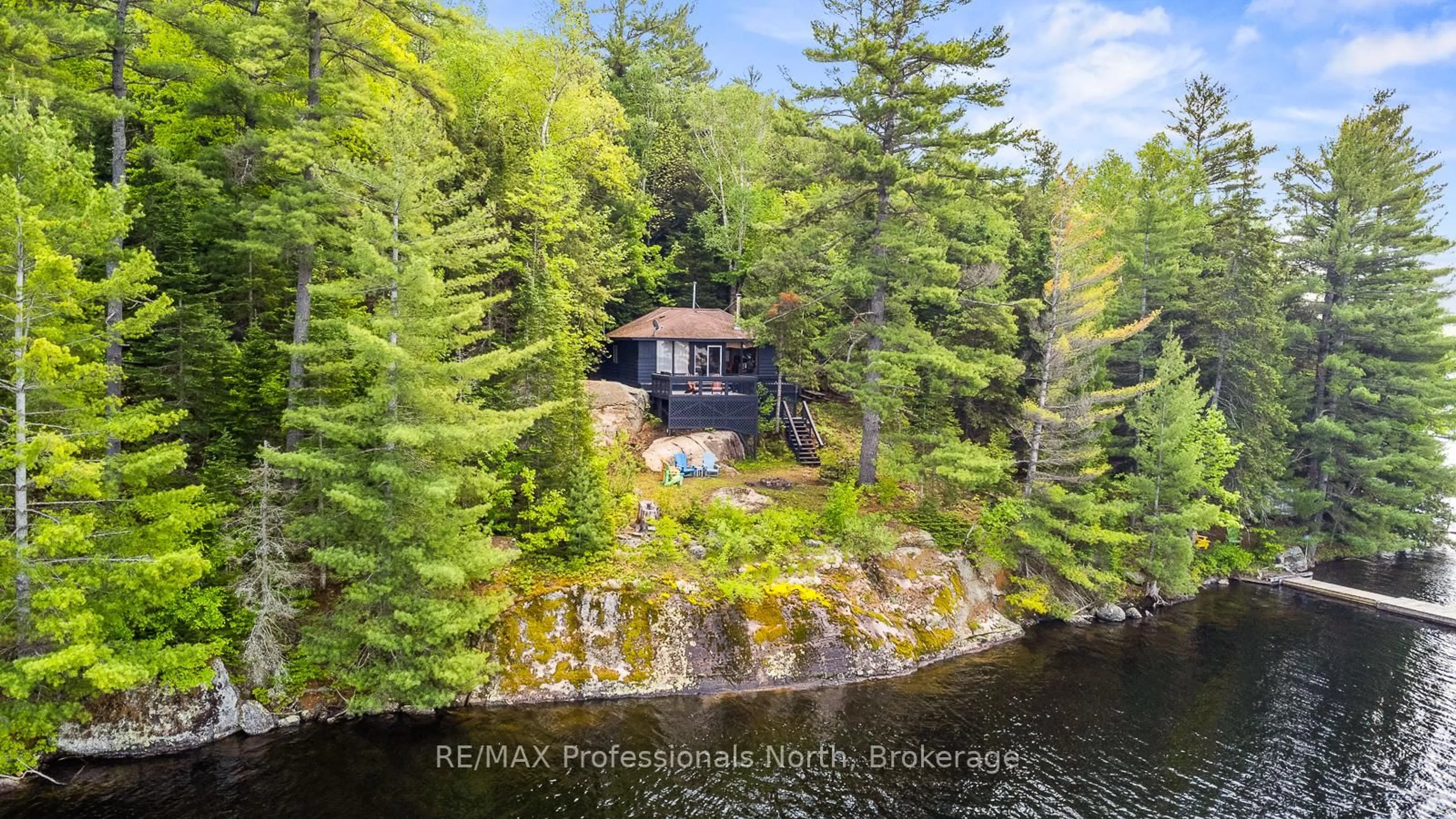 A pic from outside/outdoor area/front of a property/back of a property/a pic from drone, water/lake/river/ocean view for 11443 KUSHOG NORTH WATER, Algonquin Highlands Ontario K0M 1J2