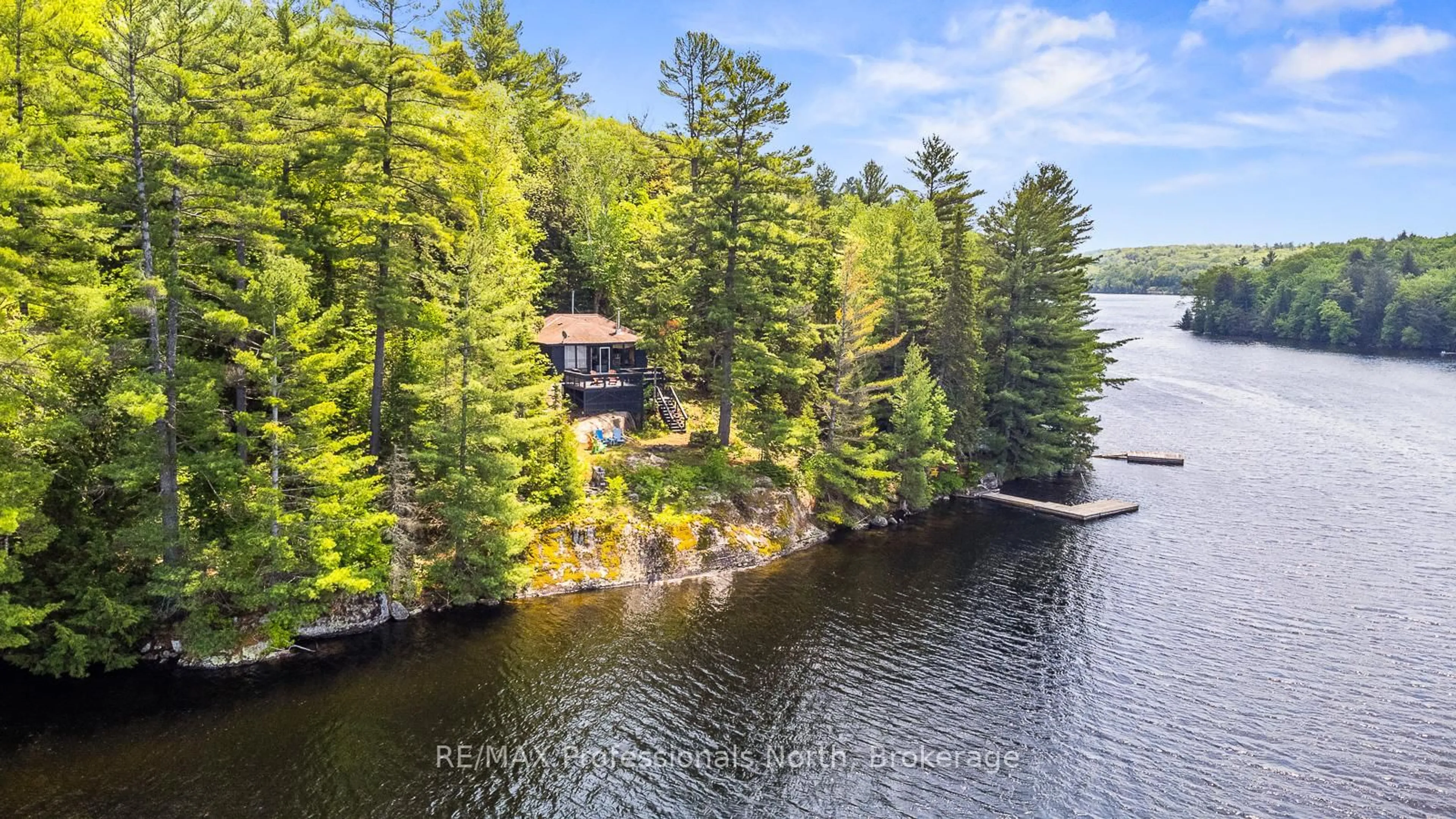 A pic from outside/outdoor area/front of a property/back of a property/a pic from drone, water/lake/river/ocean view for 11443 KUSHOG NORTH WATER, Algonquin Highlands Ontario K0M 1J2