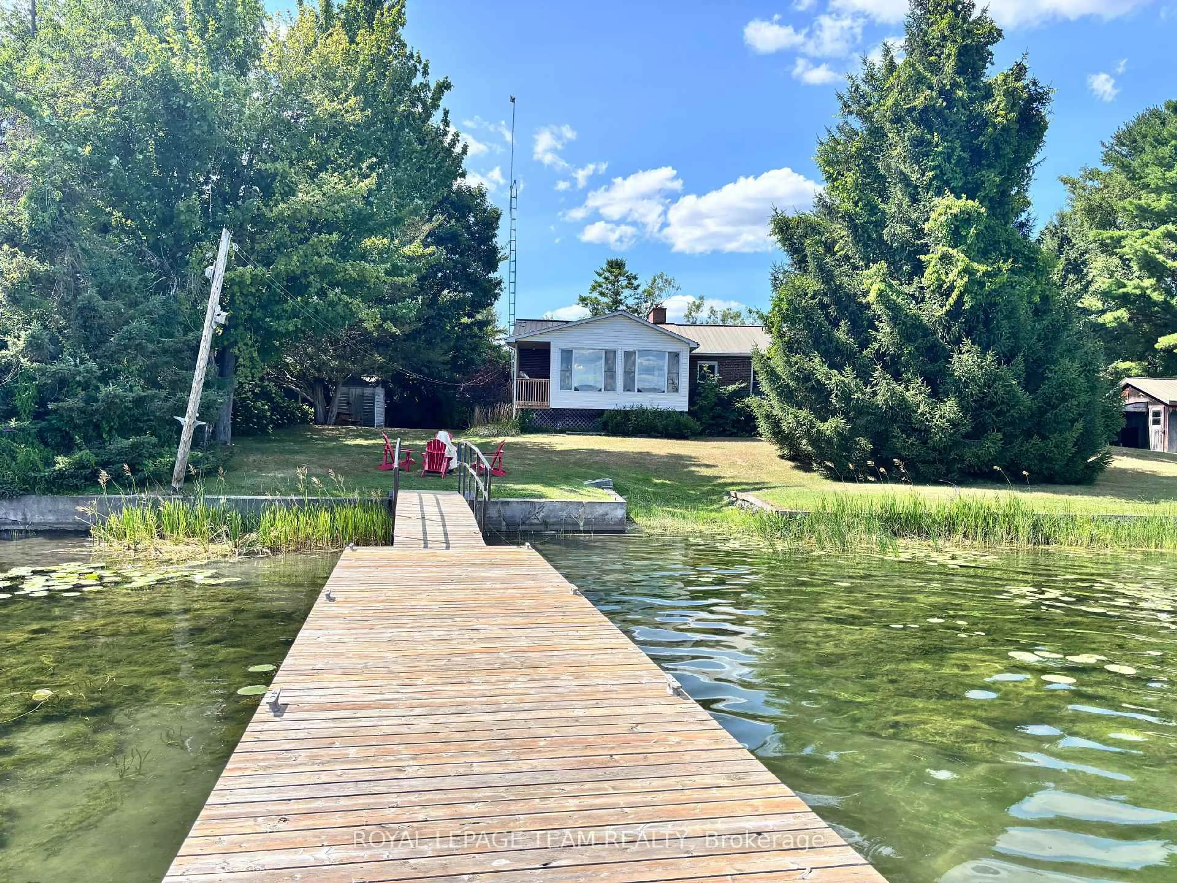 A pic from outside/outdoor area/front of a property/back of a property/a pic from drone, water/lake/river/ocean view for 39 Kerry Point Rd, Leeds and the Thousand Islands Ontario K0E 1R0