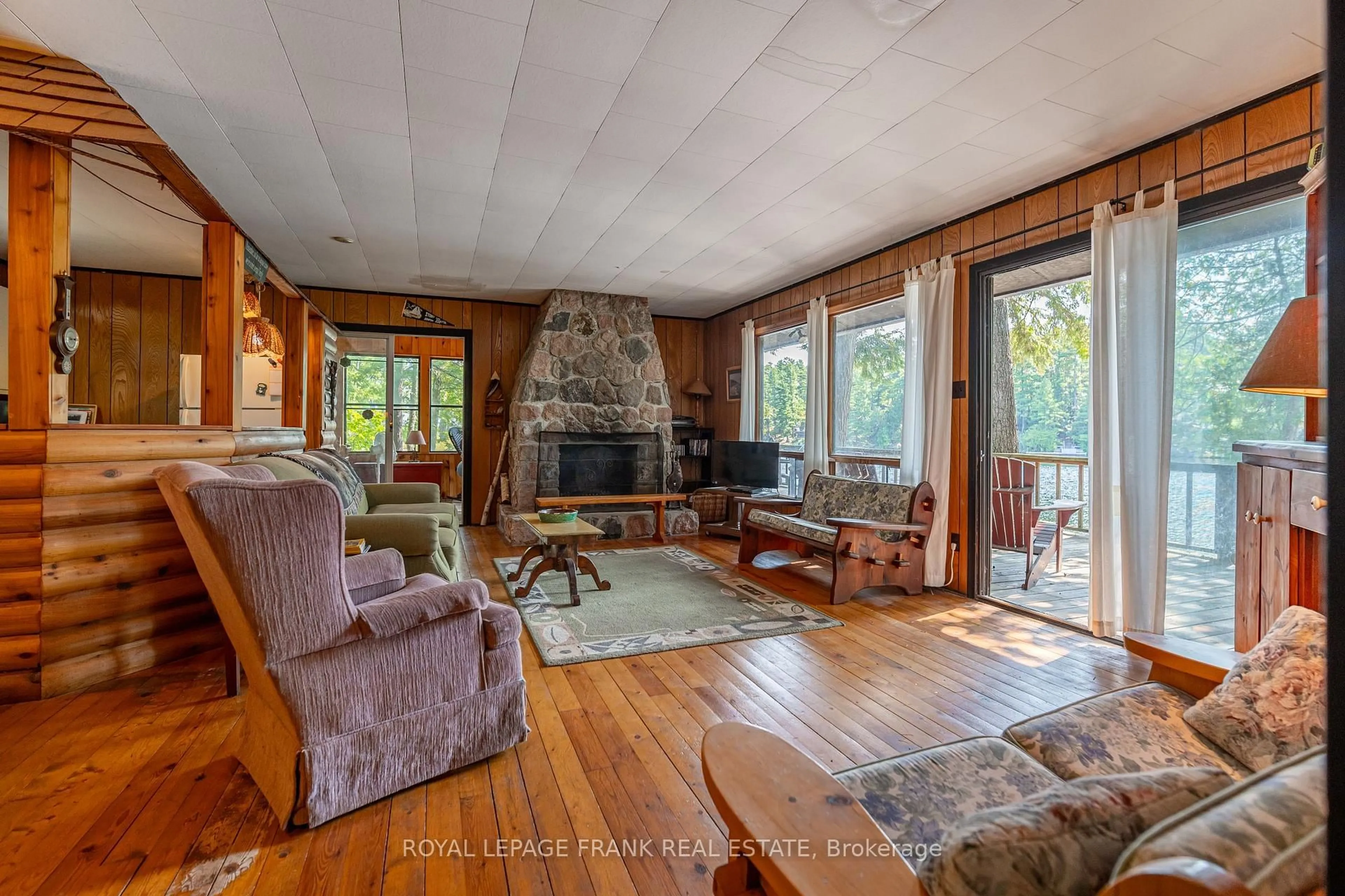 Living room with furniture, unknown for 428 & 430 Island 7 Stoney Lake, Douro-Dummer Ontario K0L 2H0