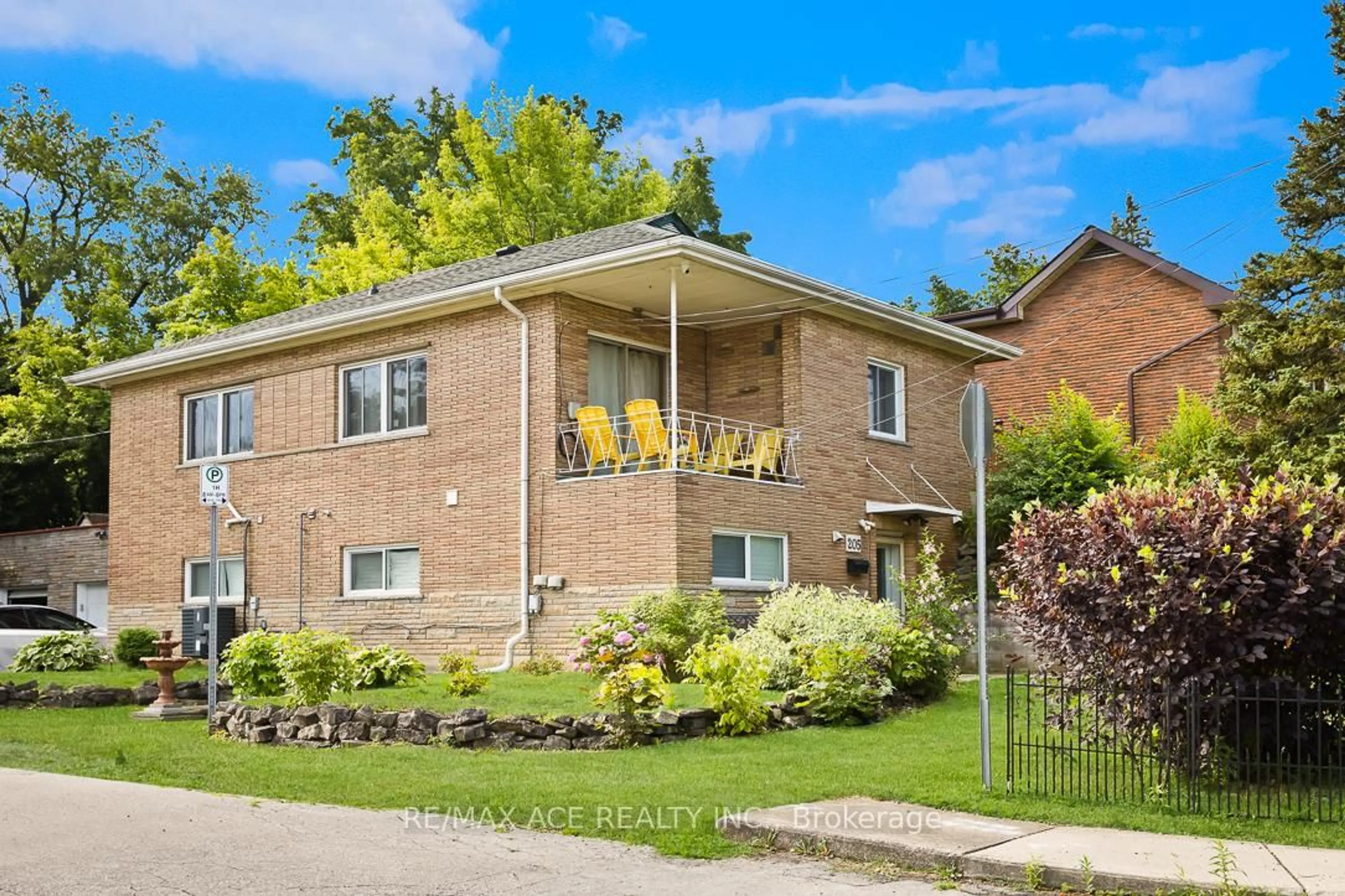 Home with brick exterior material, street for 205 Emerson St, Hamilton Ontario L8S 2Y3