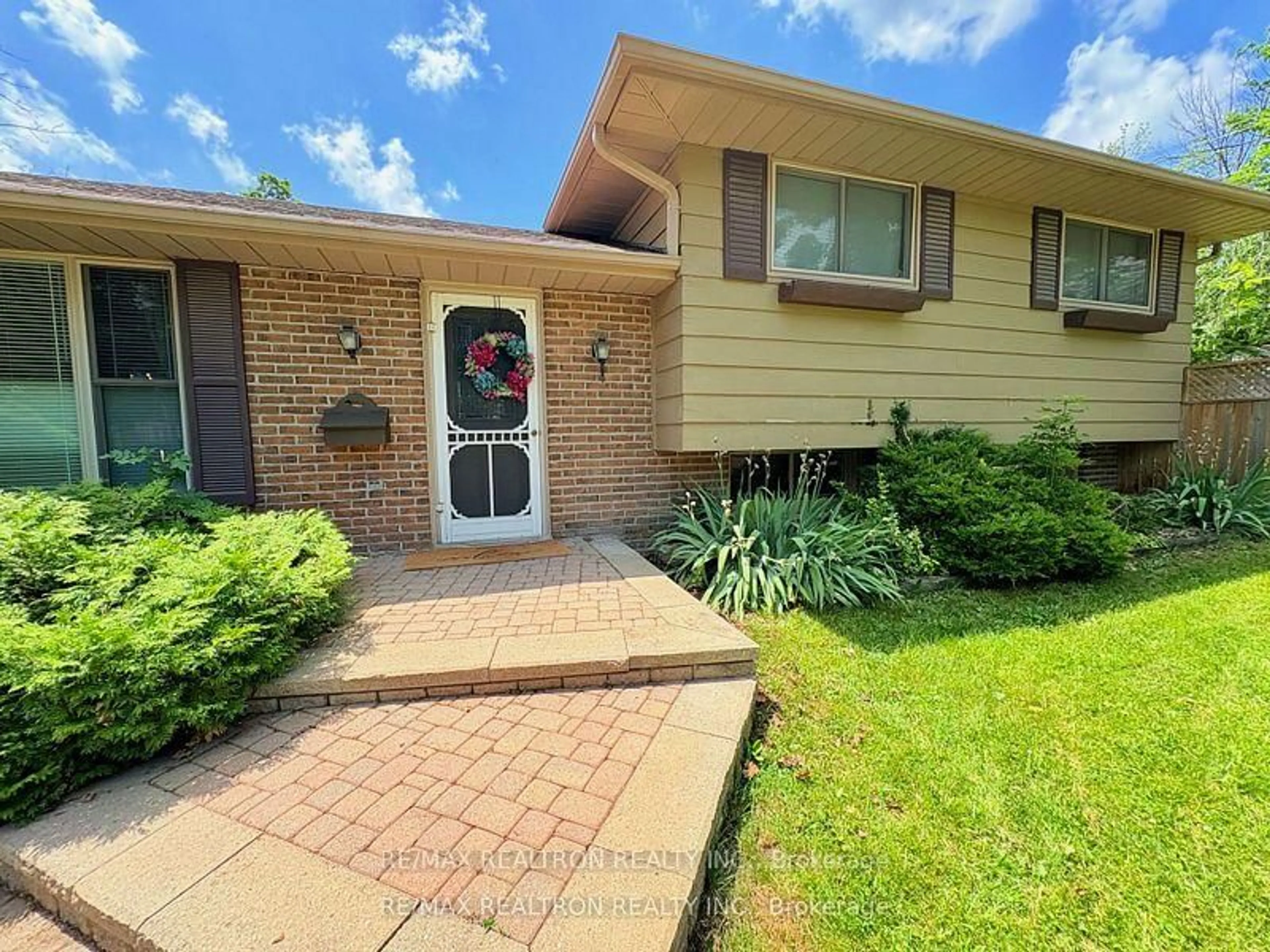 Home with brick exterior material, street for 323 Lindan Ave, Selwyn Ontario K9L 1K9