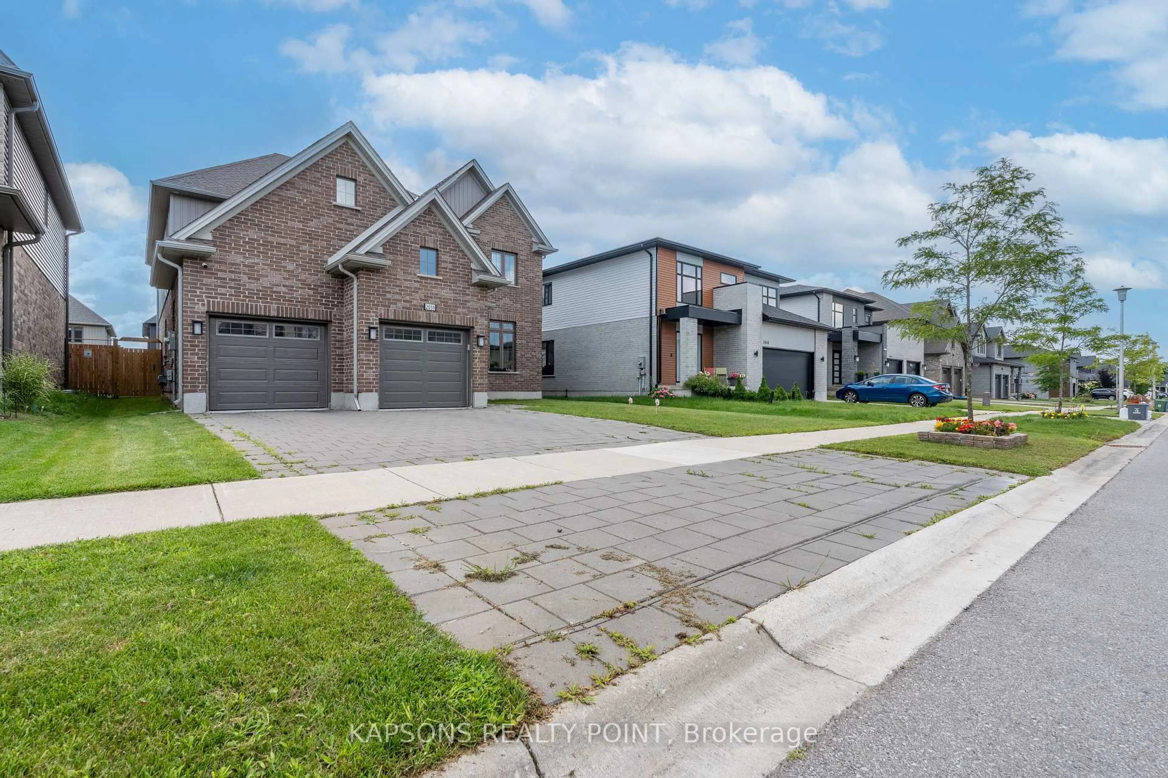 A pic from outside/outdoor area/front of a property/back of a property/a pic from drone, street for 2059 Bakervilla St, London South Ontario N6P 0E9
