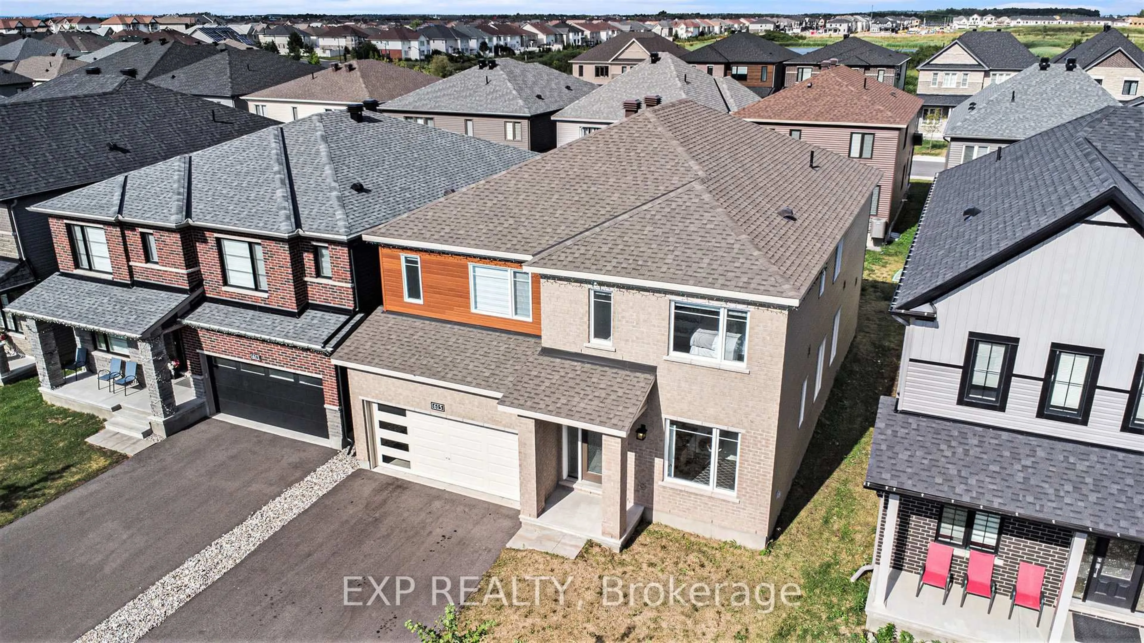 A pic from outside/outdoor area/front of a property/back of a property/a pic from drone, street for 615 IDYLLIC Terr, Ottawa Ontario K4A 5N9