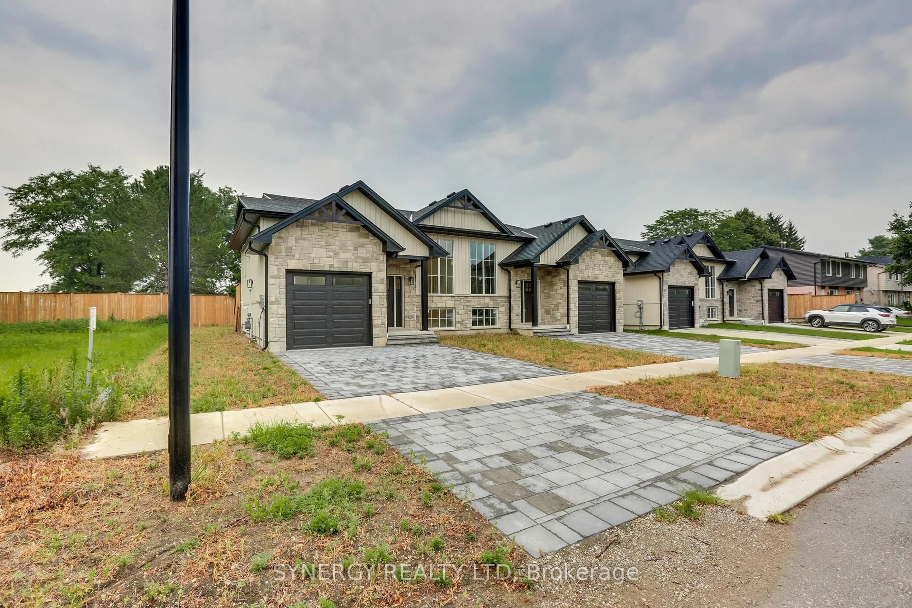 Home with brick exterior material, street for 7 Haddon Lane, Strathroy-Caradoc Ontario N7G 0B9