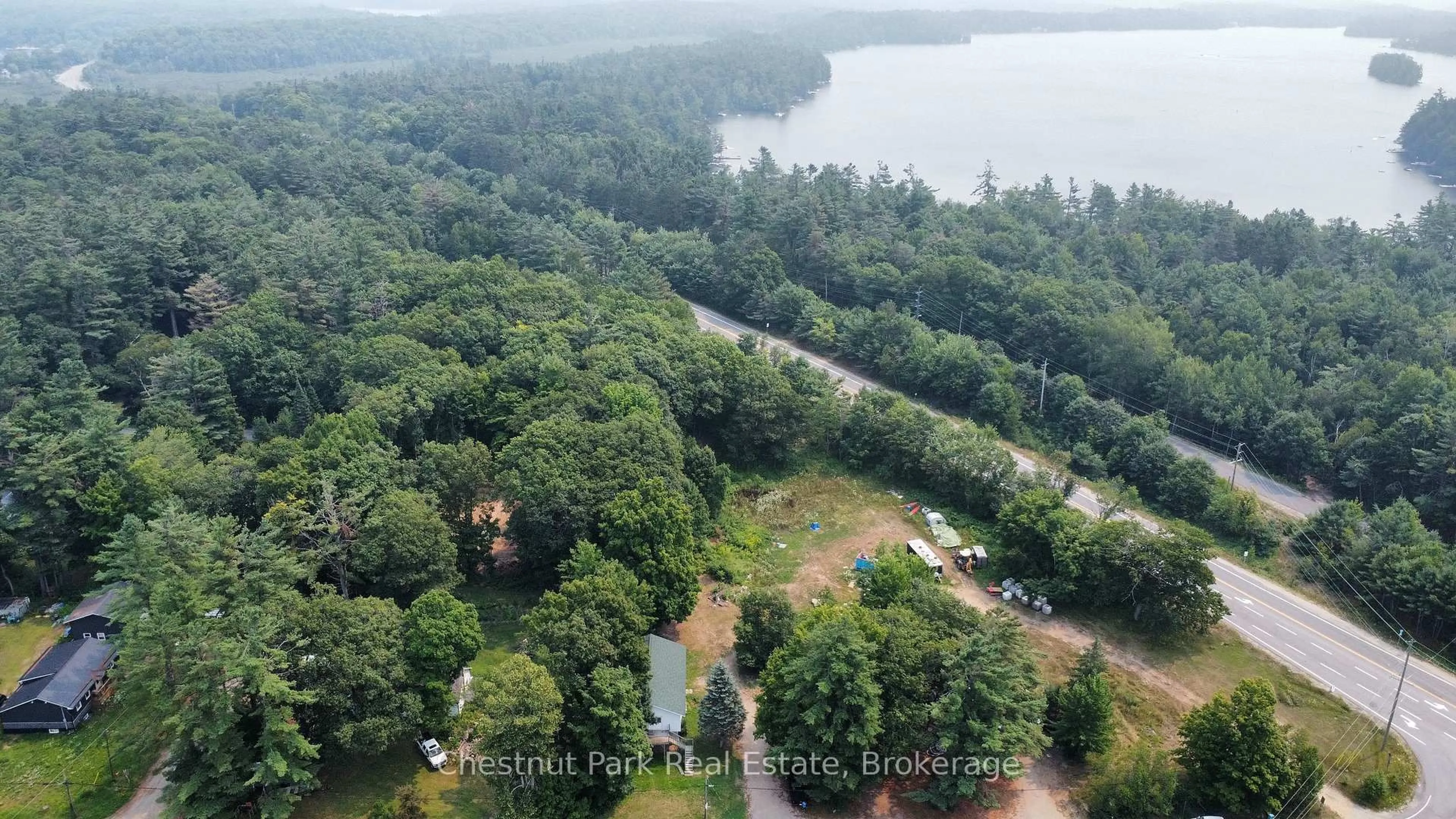 A pic from outside/outdoor area/front of a property/back of a property/a pic from drone, water/lake/river/ocean view for 1014 Torrance Rd, Muskoka Lakes Ontario P0C 1M0
