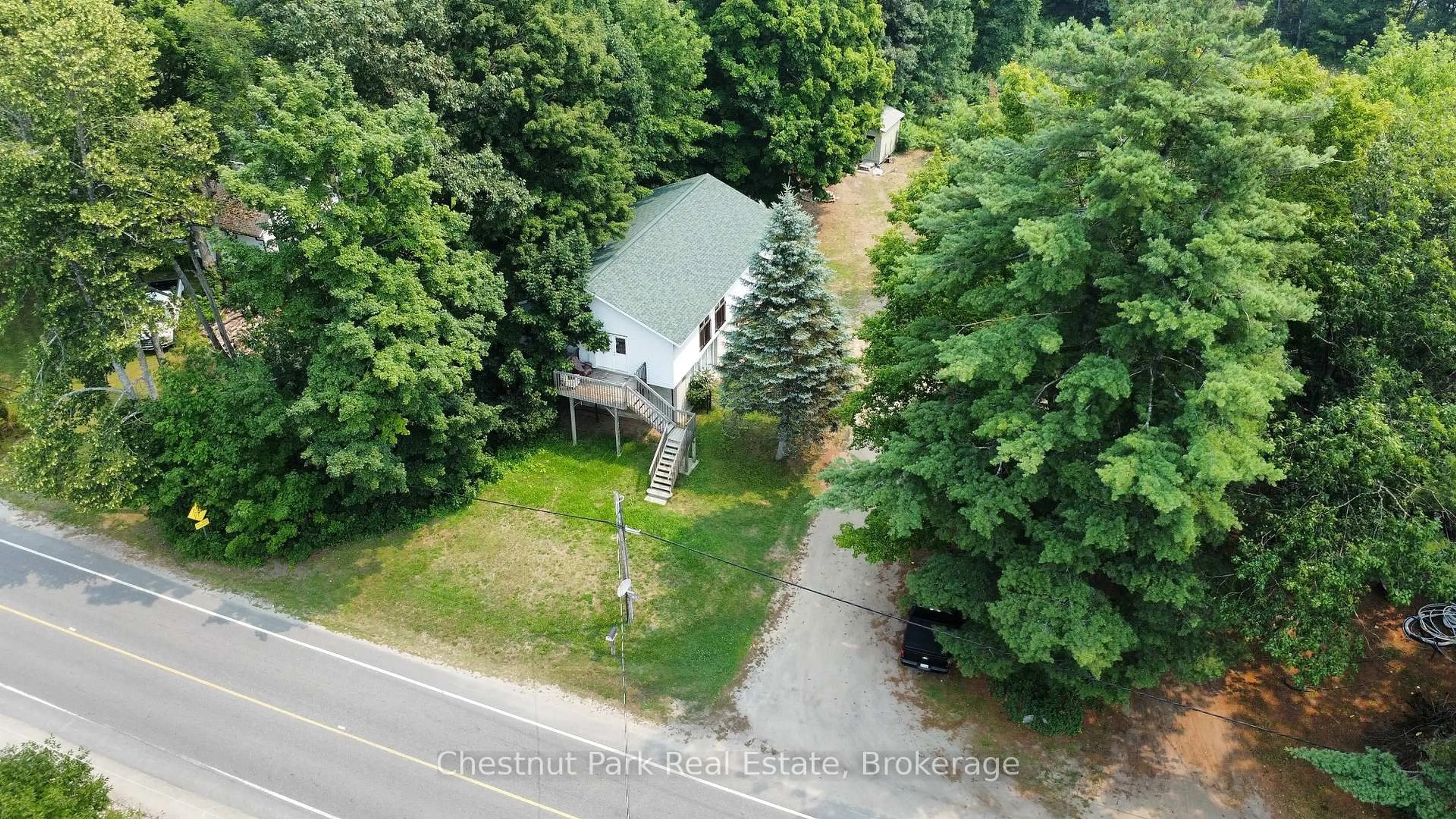 A pic from outside/outdoor area/front of a property/back of a property/a pic from drone, forest/trees view for 1014 Torrance Rd, Muskoka Lakes Ontario P0C 1M0