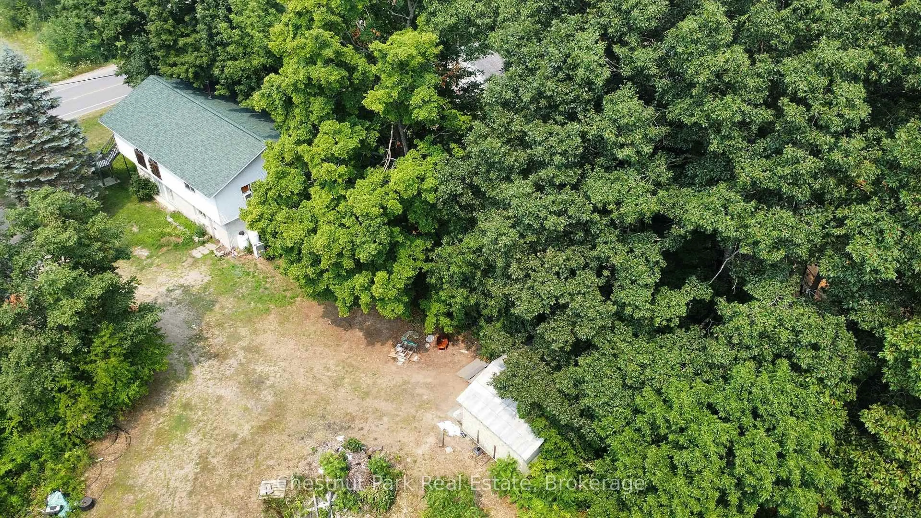 A pic from outside/outdoor area/front of a property/back of a property/a pic from drone, forest/trees view for 1014 Torrance Rd, Muskoka Lakes Ontario P0C 1M0