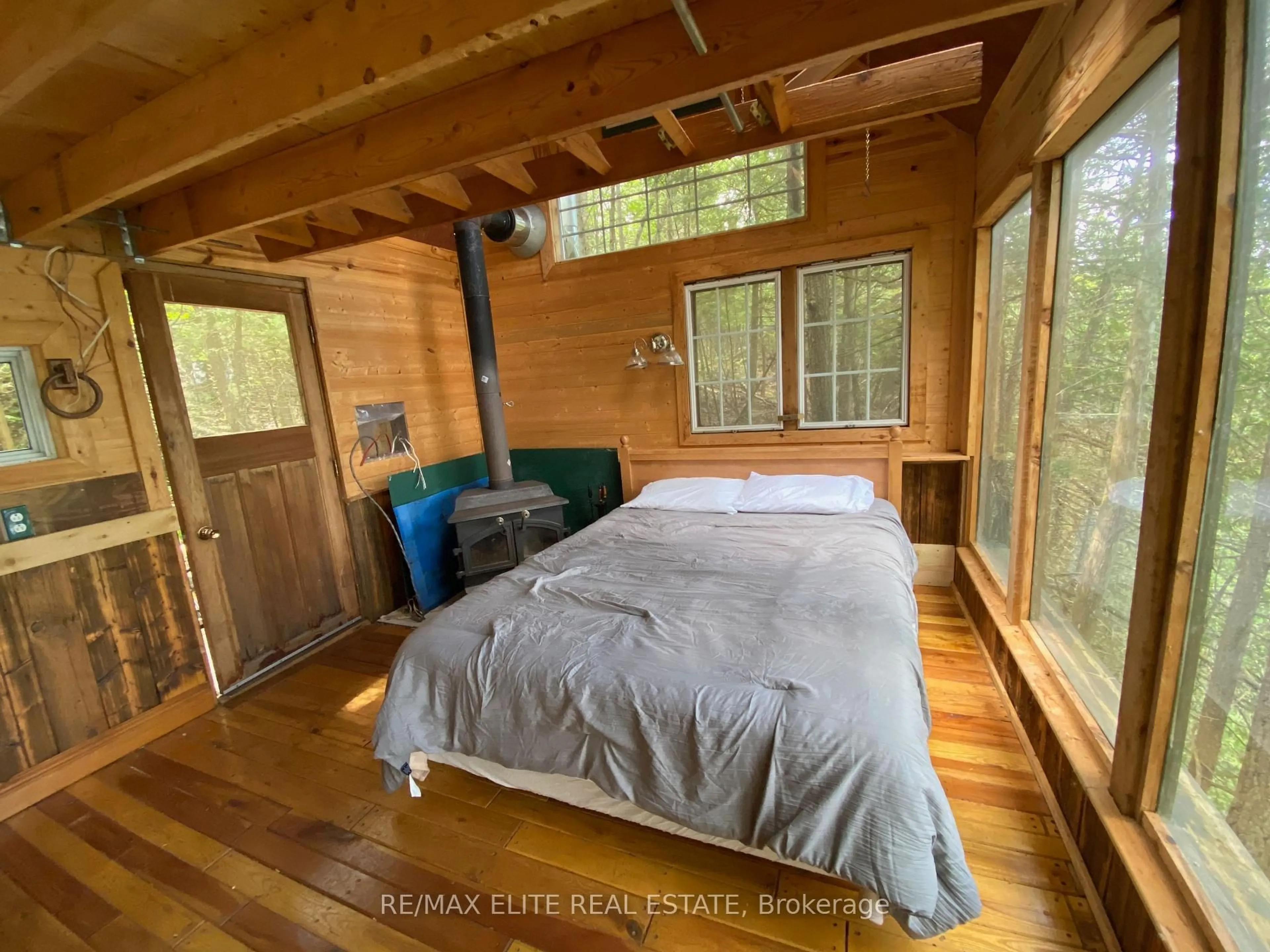 Bedroom with bed, wood/laminate floor for 376 Faradale Crt, Bancroft Ontario K0L 1C0