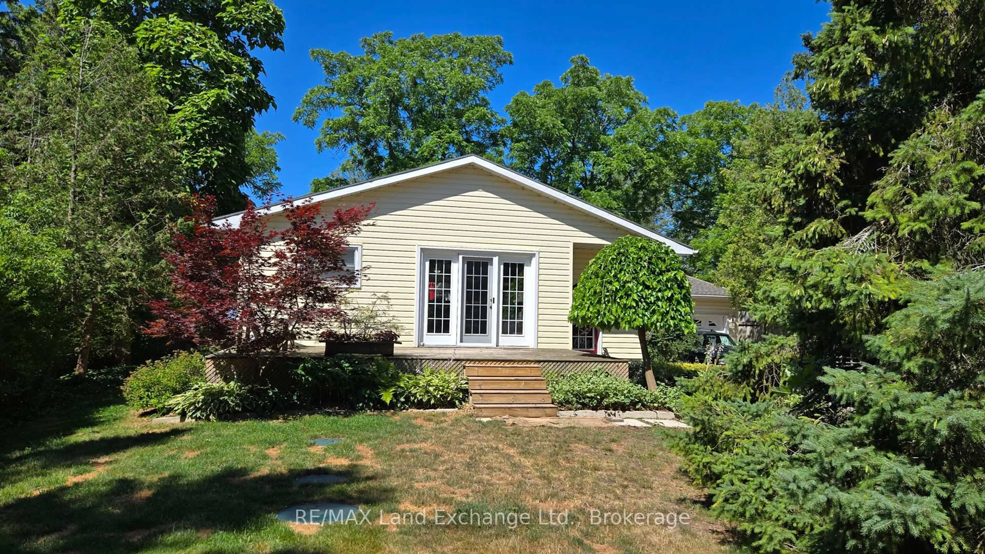 Home with brick exterior material, street for 213 Huron Rd, R. R. #1 Rd, Huron-Kinloss Ontario N2Z 2X3