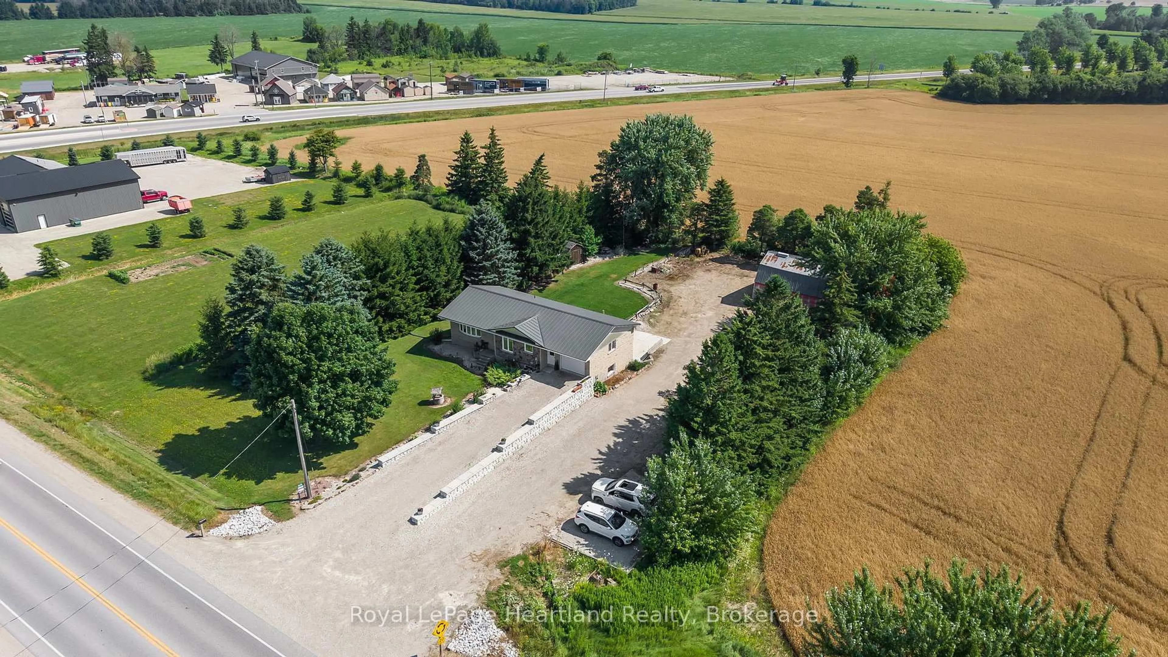 A pic from outside/outdoor area/front of a property/back of a property/a pic from drone, street for 8715 Wellington Rd 7 Rd, Mapleton Ontario N0G 2P0