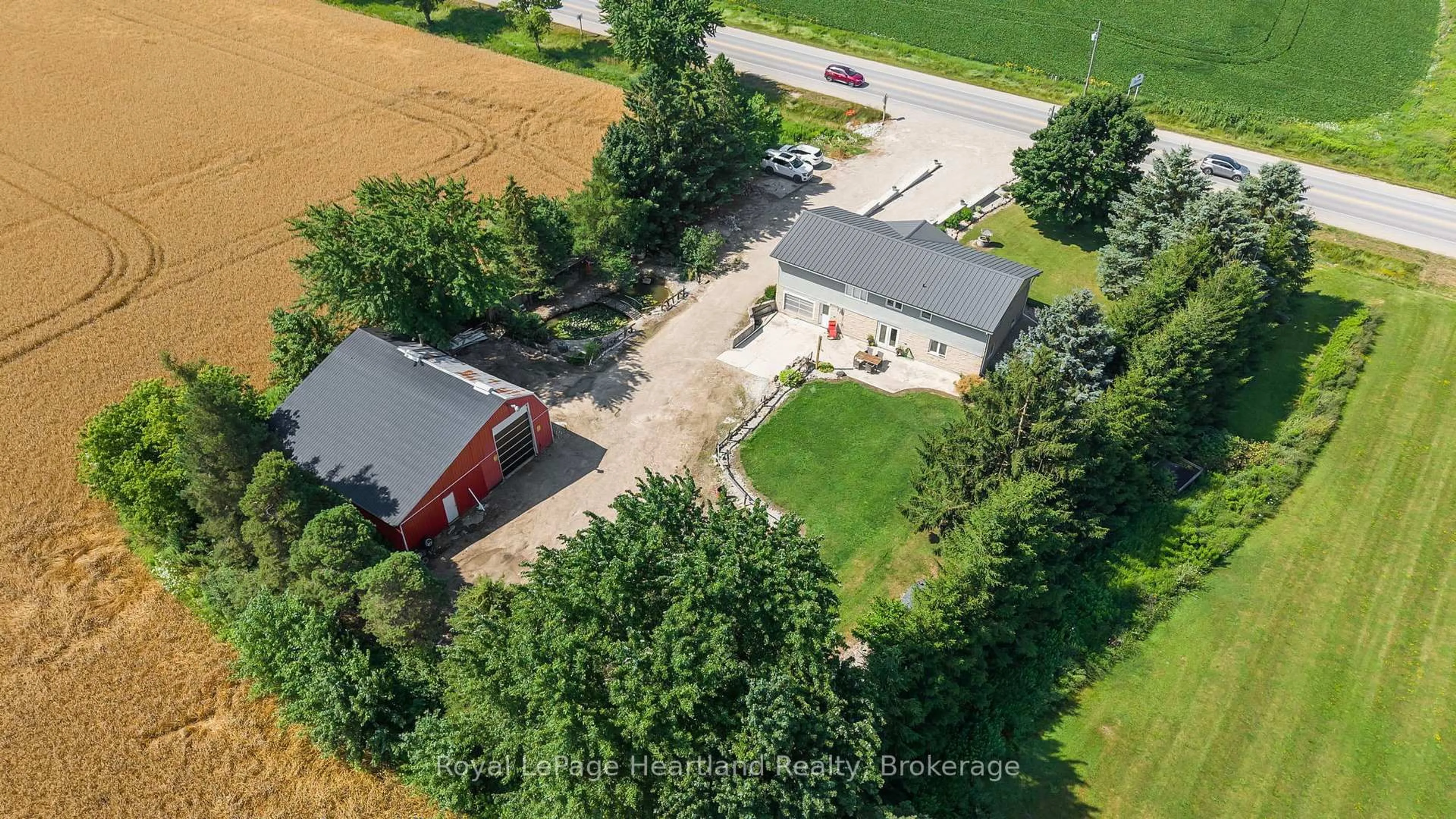 A pic from outside/outdoor area/front of a property/back of a property/a pic from drone, building for 8715 Wellington Rd 7 Rd, Mapleton Ontario N0G 2P0