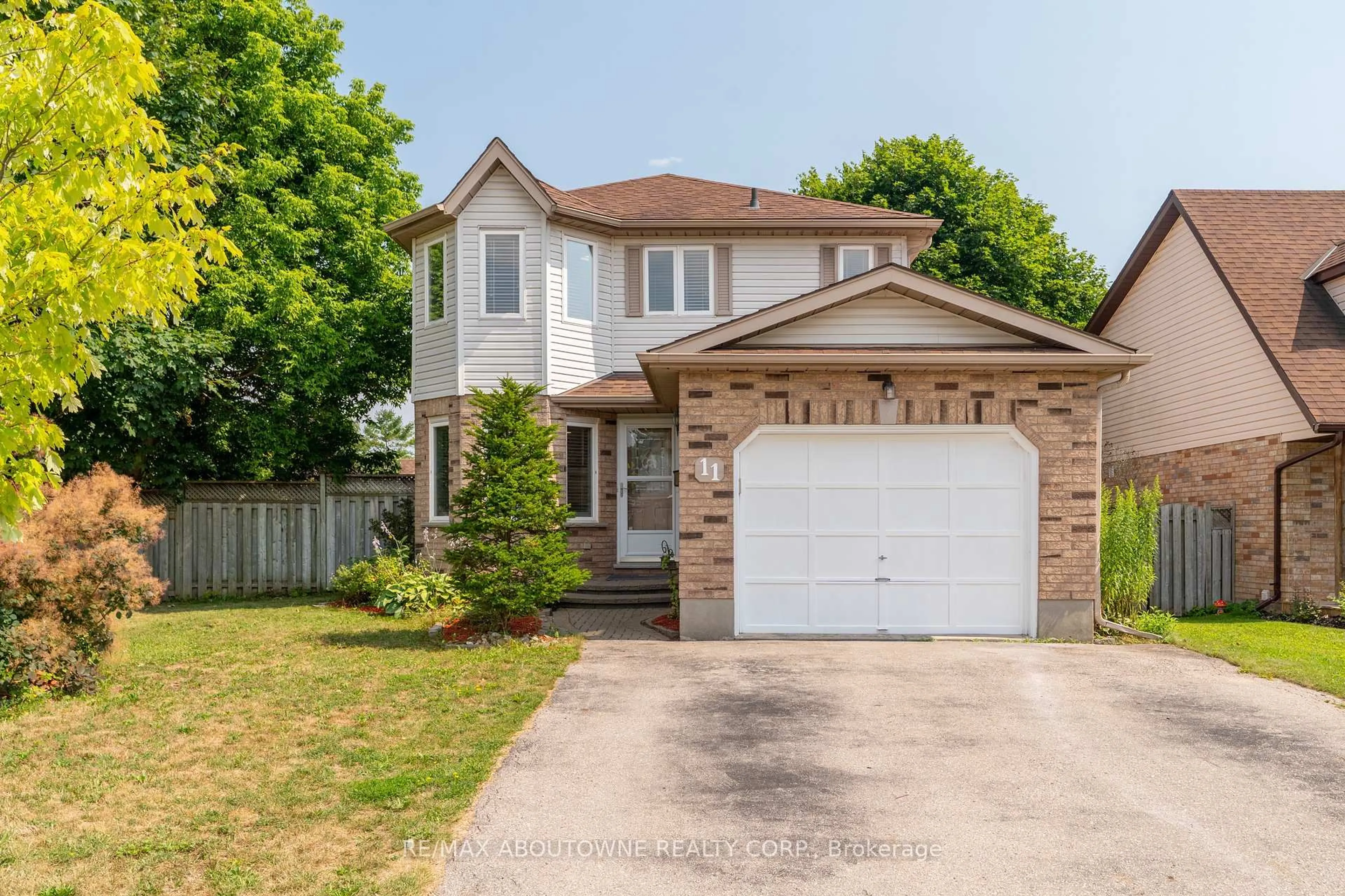 Home with brick exterior material, street for 11 Bushmills Cres, Guelph Ontario N1K 1T5