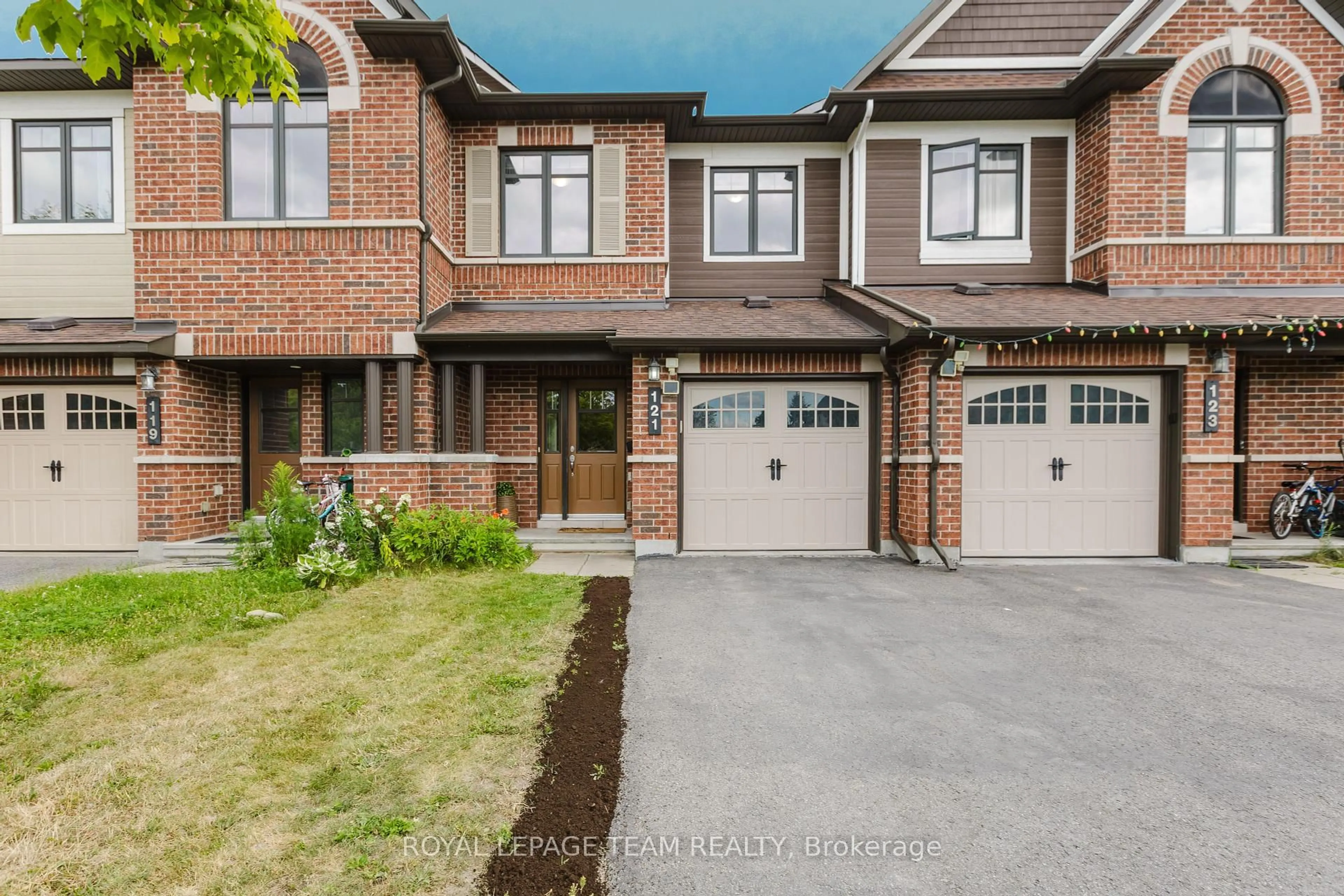 Home with brick exterior material, street for 121 Mancini Way, Ottawa Ontario K2J 5X3